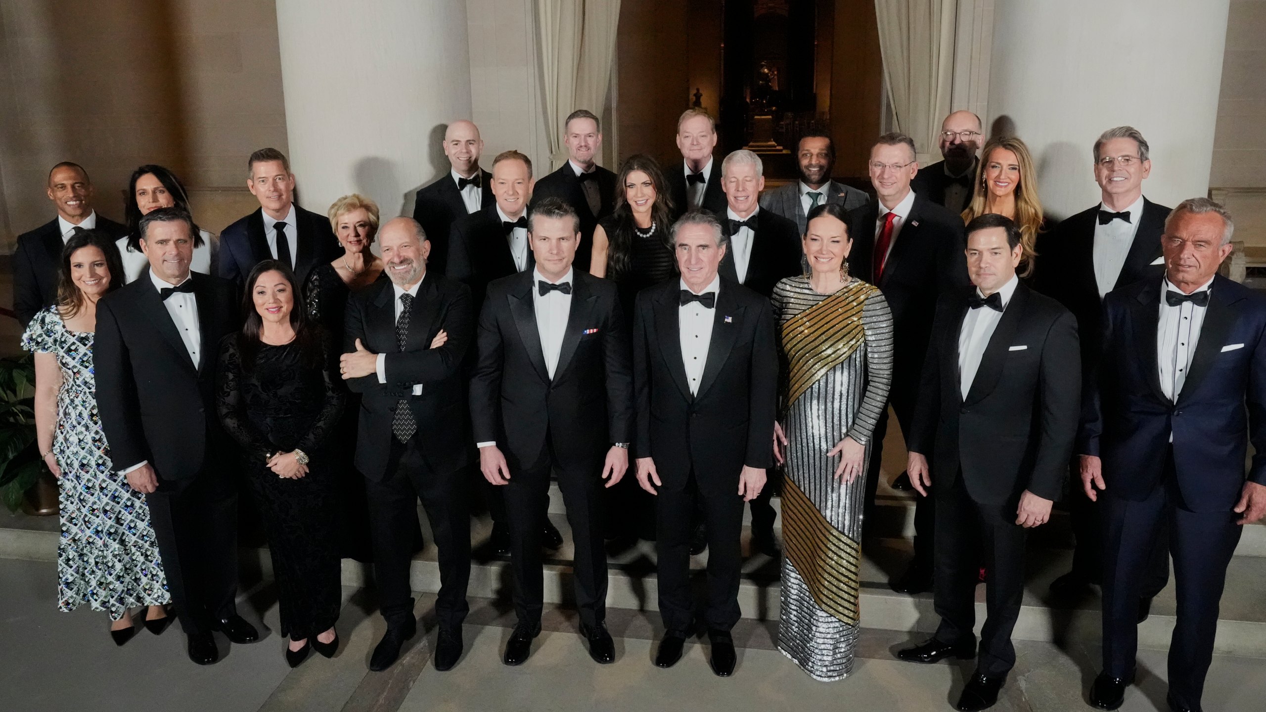 President-elect Donald Trump's Cabinet picks, other nominees and appointments, pose for a photo at the National Gallery of Art in Washington, Saturday, Jan. 18, 2025. First row from left, Elise Stefanik, John Ratcliffe, Lori Chavez-DeRemer, Howard Lutnick, Pete Hegseth, Doug Burgum, Brooke L. Rollins, Marco Rubio and Robert F. Kennedy Jr.; second row from left, Scott Turner, Tulsi Gabbard, Sean Duffy, Linda McMahon, Lee Zeldin, Kristi Noem, Chris Wright, Doug Collins, Kelly Loeffler and Scott Bessent; and third row from left, Stephen Miran, Jamieson Greer, Kevin Hassett, Kash Patel and Russell Vought. (AP Photo/Mark Schiefelbein)
