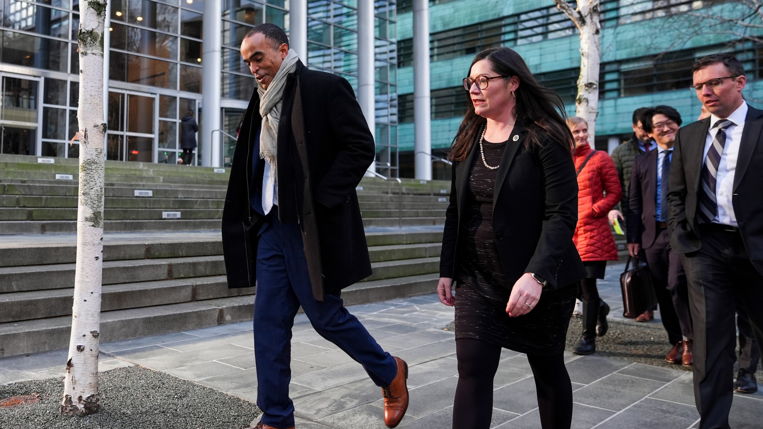 Washington Attorney General Nick Brown departs a press availability after a federal judge temporarily blocked President Donald Trump's executive order aimed at ending birthright citizenship in a case brought by the states of Washington, Arizona, Illinois and Oregon, Thursday, Jan. 23, 2025, in Seattle. (AP Photo/Lindsey Wasson)