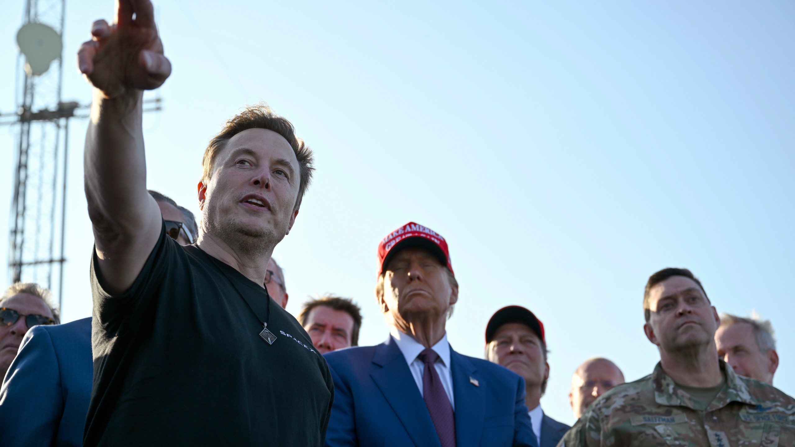 FILE - Elon Musk talks with President-elect Donald Trump before the launch of the sixth test flight of the SpaceX Starship rocket Tuesday, Nov. 19, 2024 in Boca Chica, Texas. (Brandon Bell/Pool via AP, File)