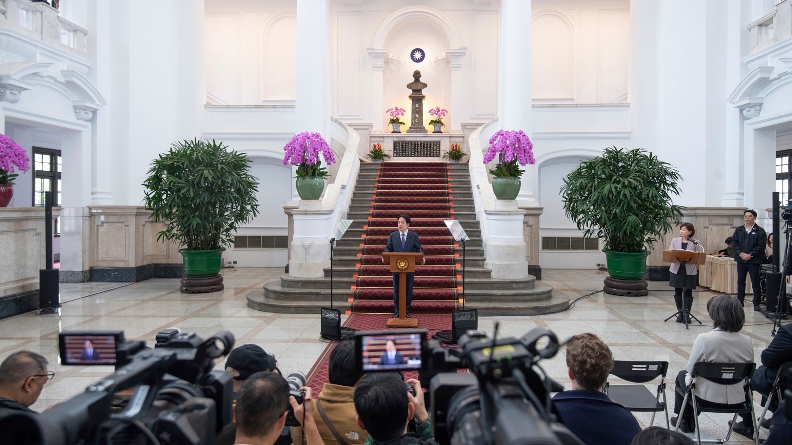 In this photo released by the Taiwan Presidential Office, Taiwan's President Lai Ching-te speaks at a press conference after a security meeting about U.S. President Trump's tariffs on trade partners and semiconductors at the Presidential office in Taipei, Friday, Feb. 14, 2025. (Taiwan Presidential Office via AP)