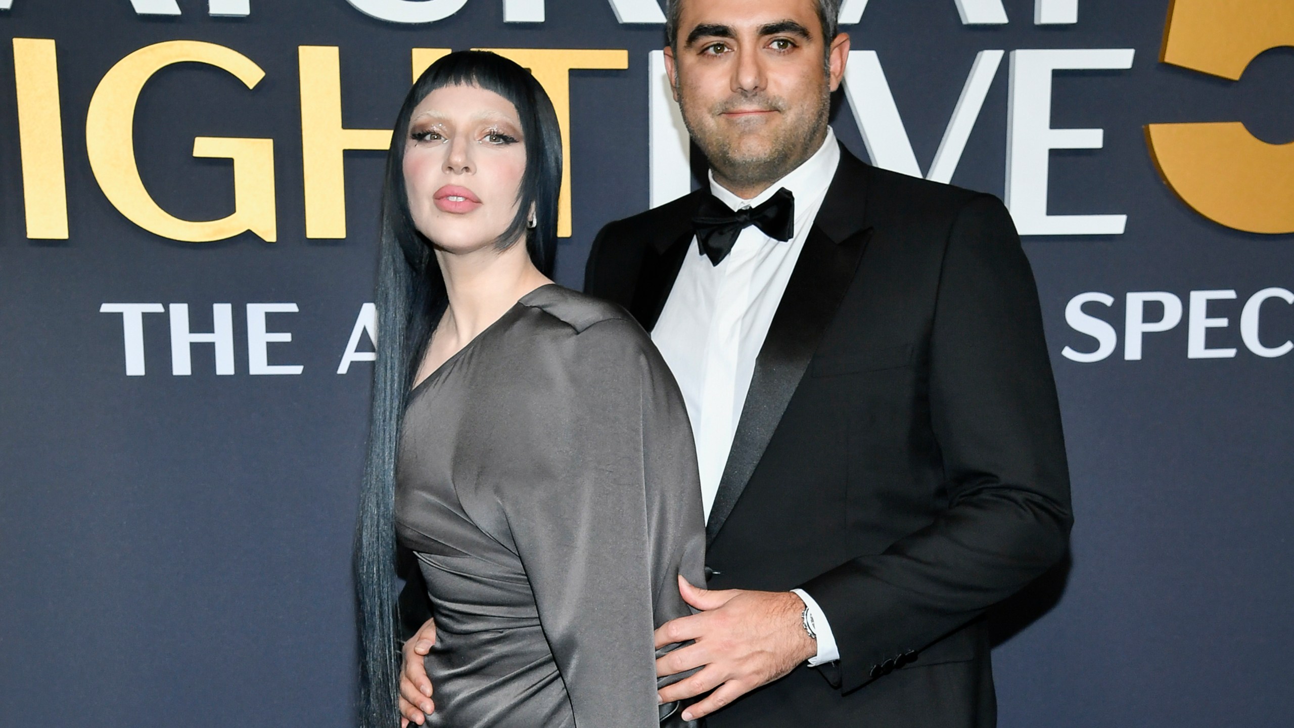 Lady Gaga, left, and fiancé Michael Polansky attend the "SNL50: The Anniversary Special" at Rockefeller Plaza on Sunday, Feb. 16, 2025, in New York. (Photo by Evan Agostini/Invision/AP)