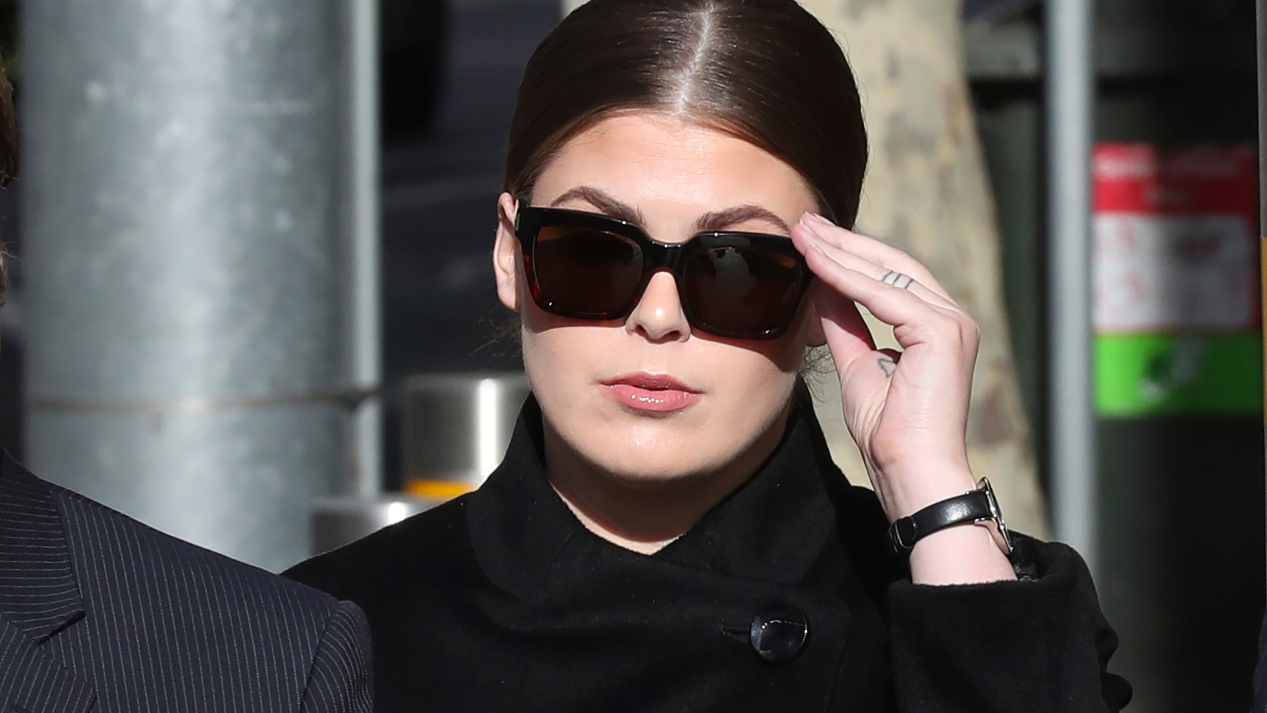 Belle Gibson arrives at the Federal Court in Melbourne, Australia, May 14, 2019. (David Crosling/AAP Image via AP)
