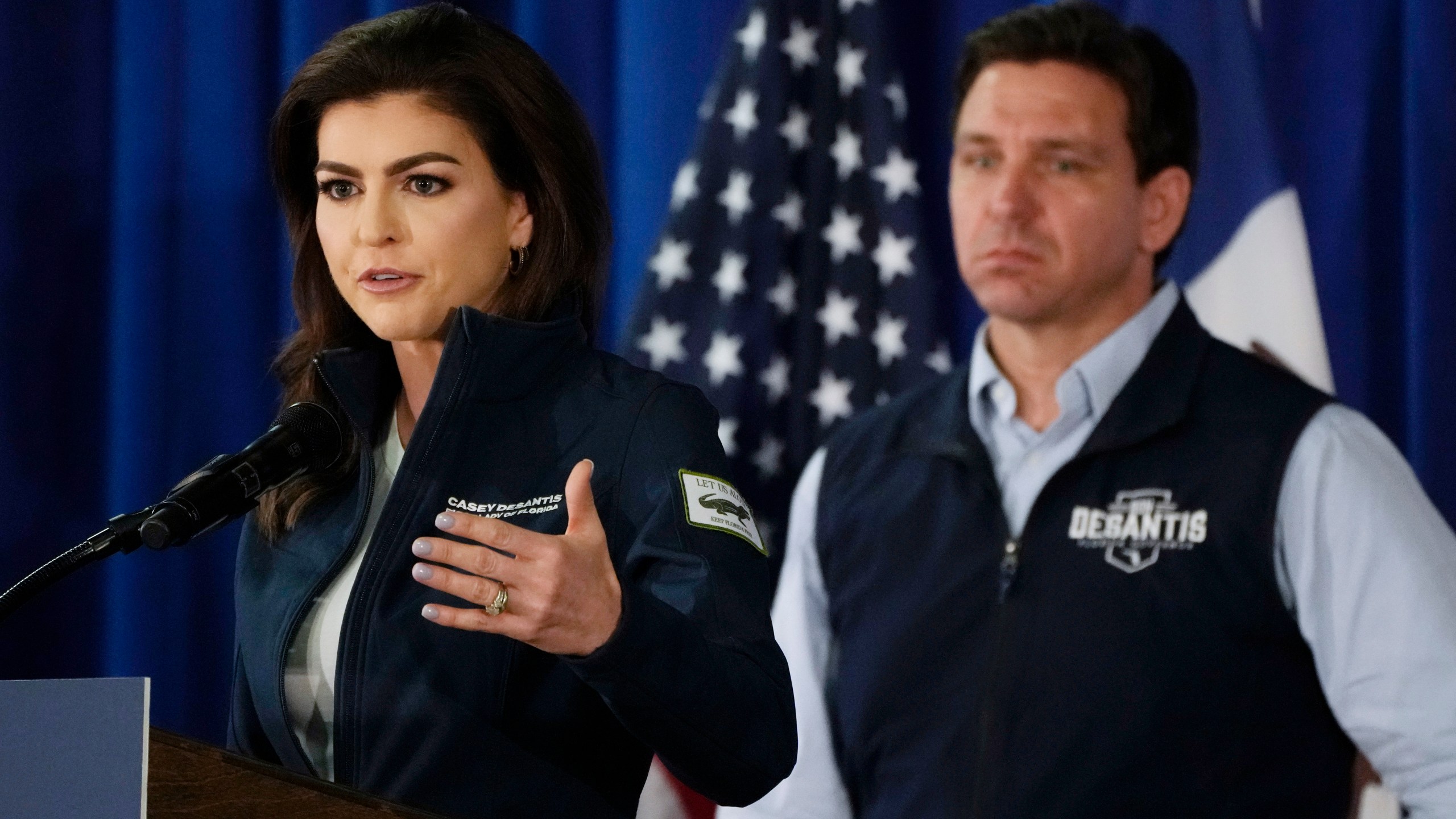 FILE - Florida first lady Casey DeSantis speaks as her husband Republican presidential candidate Florida Gov. Ron DeSantis looks on during a campaign event, Wednesday, May 31, 2023, in Cedar Rapids, Iowa. (AP Photo/Charlie Neibergall, File)