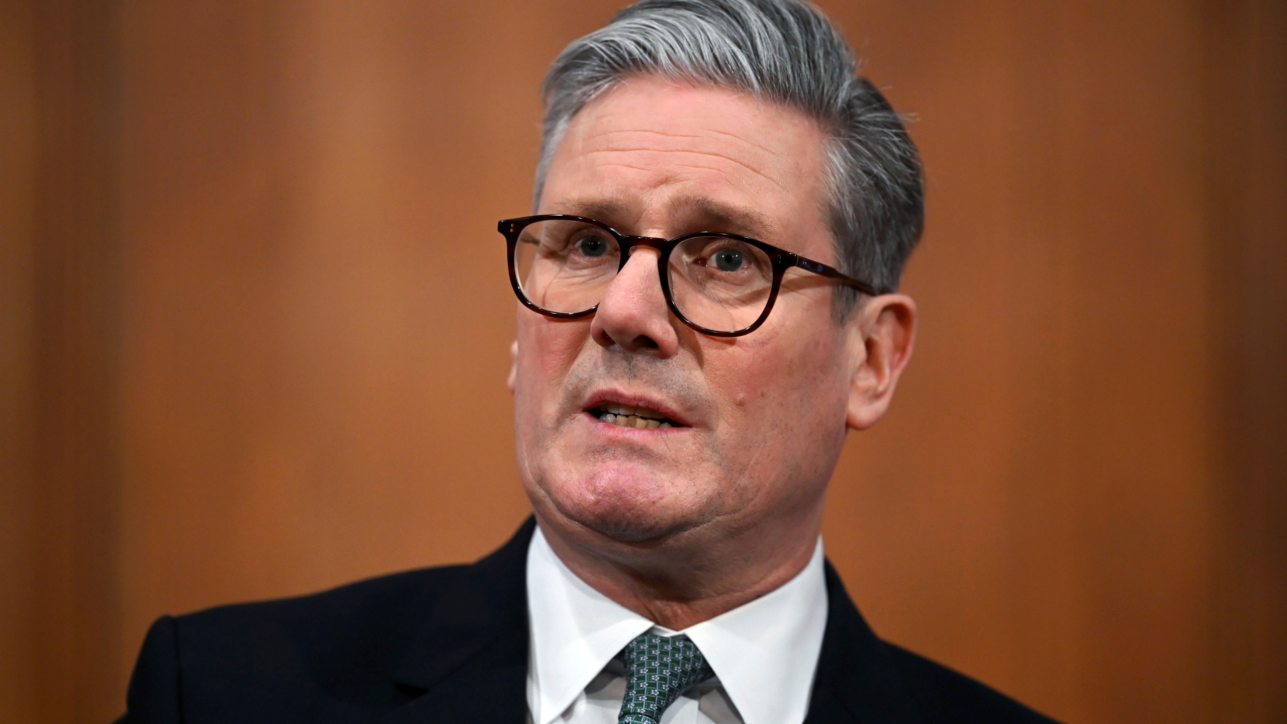 Britain's Prime Minister Keir Starmer delivers a statement on Defence spending at Downing Street in London, Tuesday, Feb, 25, 2025. (Leon Neal/Pool photo via AP)