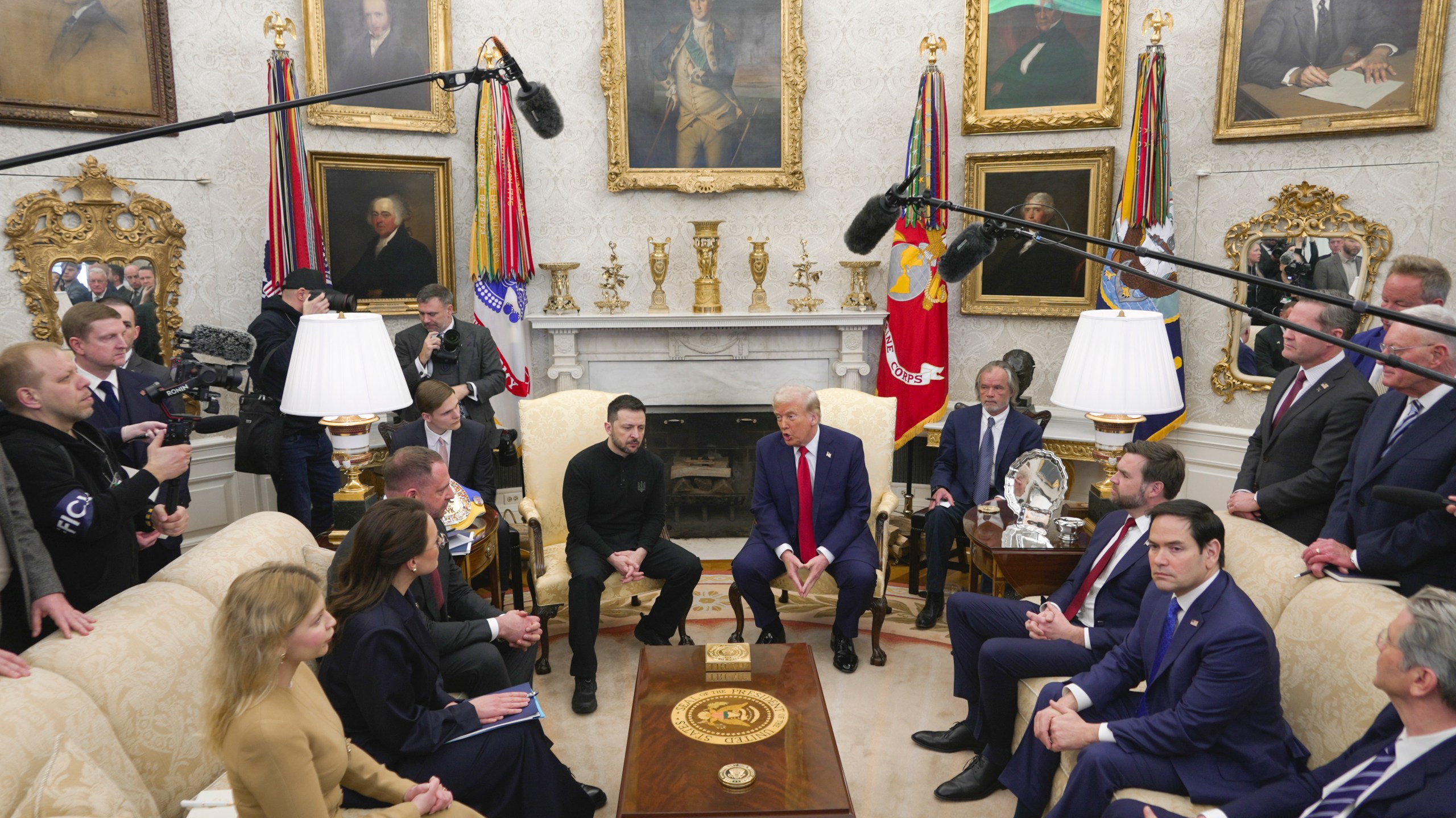 President Donald Trump, center right, meets with Ukrainian President Volodymyr Zelenskyy, center left, as Secretary of State Marco Rubio, seated from second right, and Vice President JD Vance listen at the Oval Office at the White House, Friday, Feb. 28, 2025, in Washington, . (AP Photo/ Mystyslav Chernov)