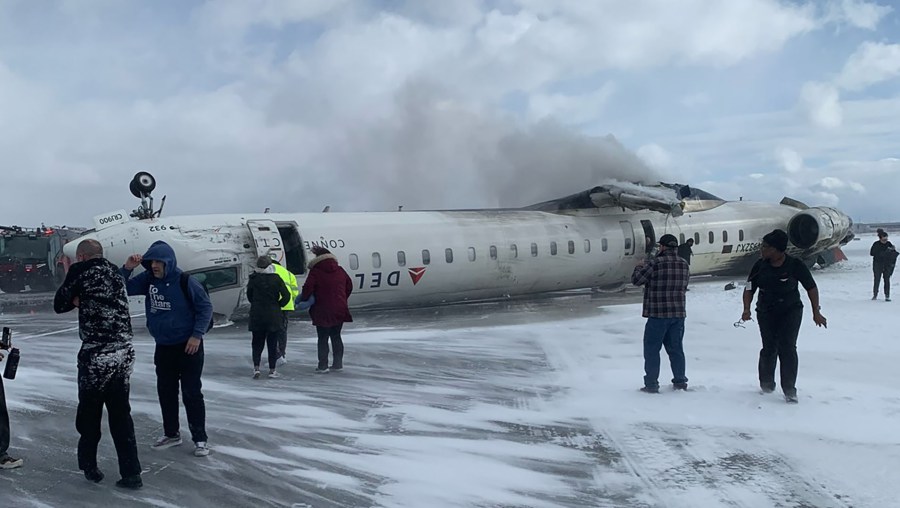A Delta plane flipped over upon landing in Toronto