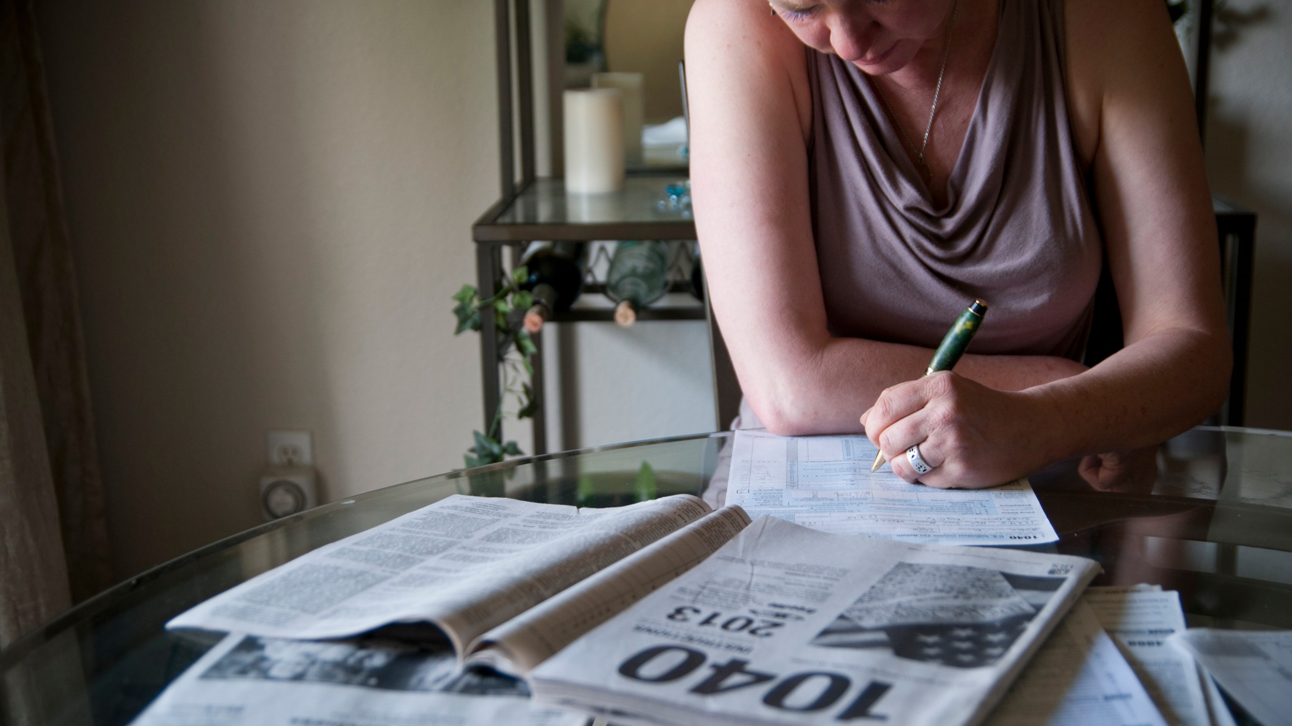 woman working on taxes