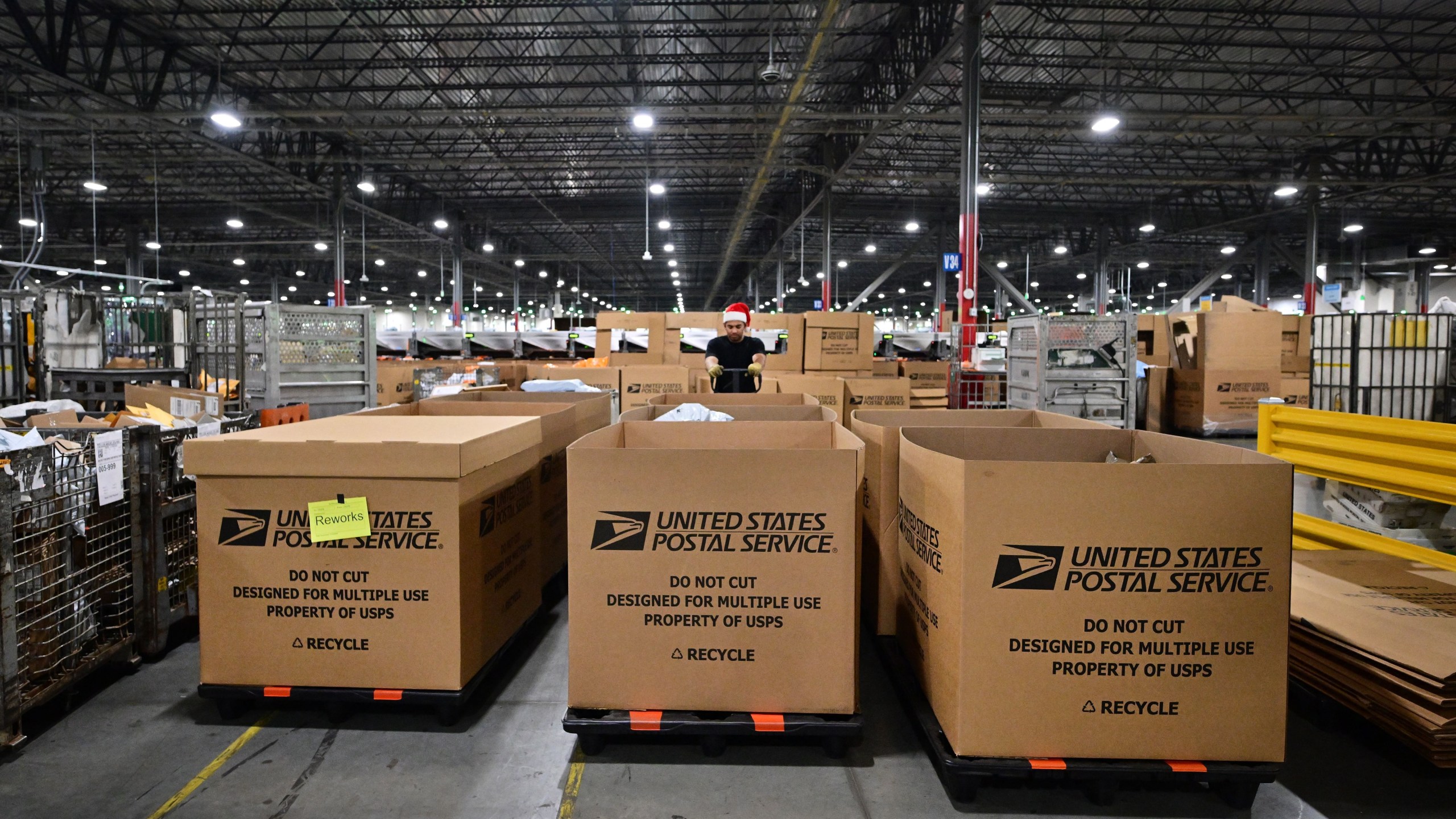 boxes of mailed goods at mail processing facility