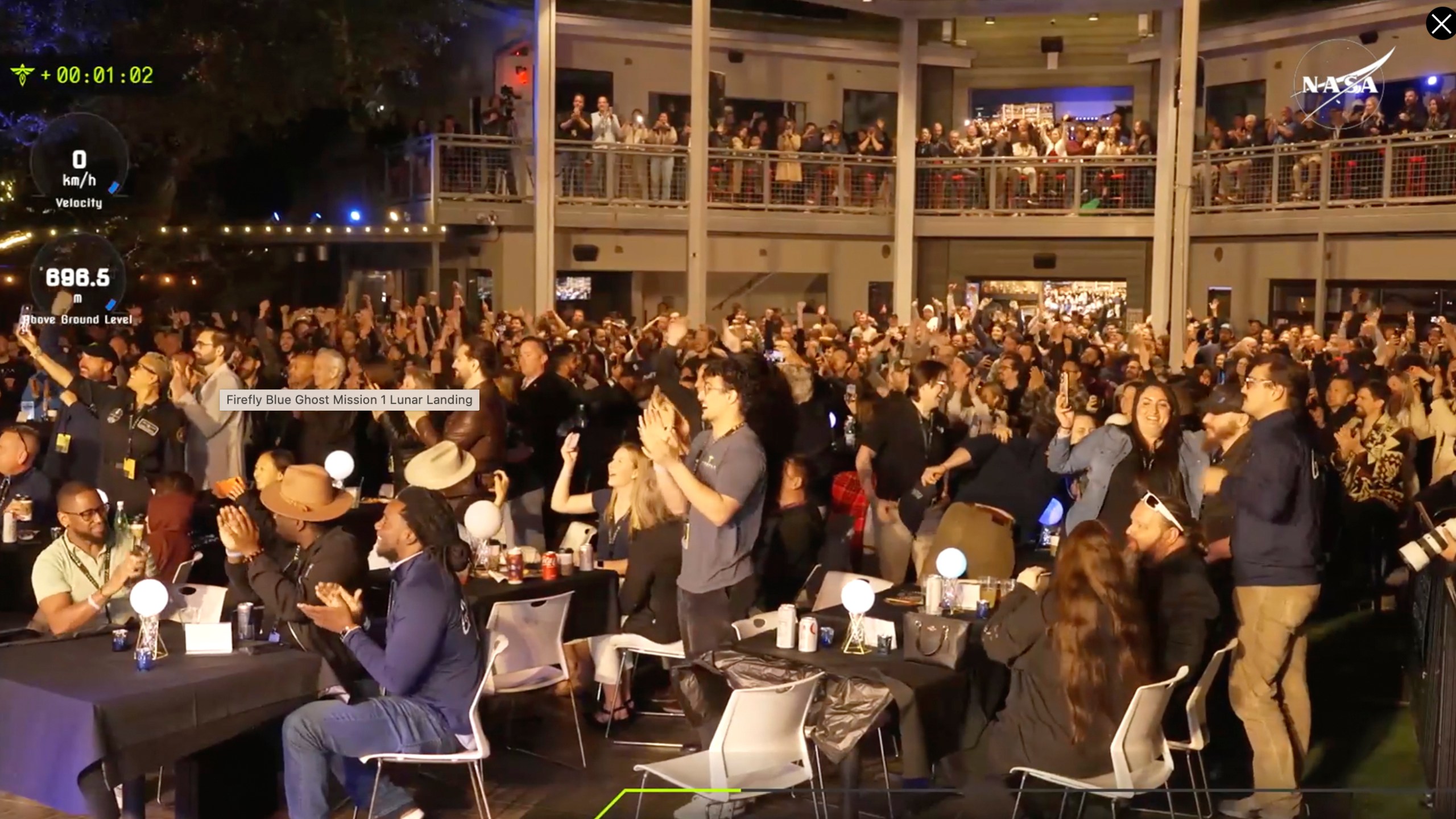 Staff at the Mission Control outside Austin, Texas celebrating as lunar lander Blue Ghost touches down on the moon with a special delivery for NASA, Sunday, March 2, 2025. (NASA/Firefly Aerospace via AP)