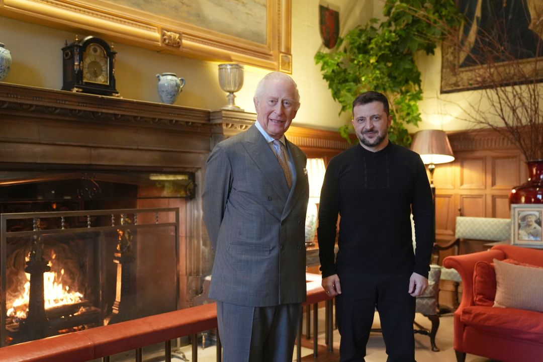 Britain's King Charles III and Ukrainian President Volodymyr Zelenskyy, right, pose for a picture during their meeting at the Sandringham Estate in Norfolk, England, Sunday, March 2, 2025. (Joe Giddens/Pool via AP)