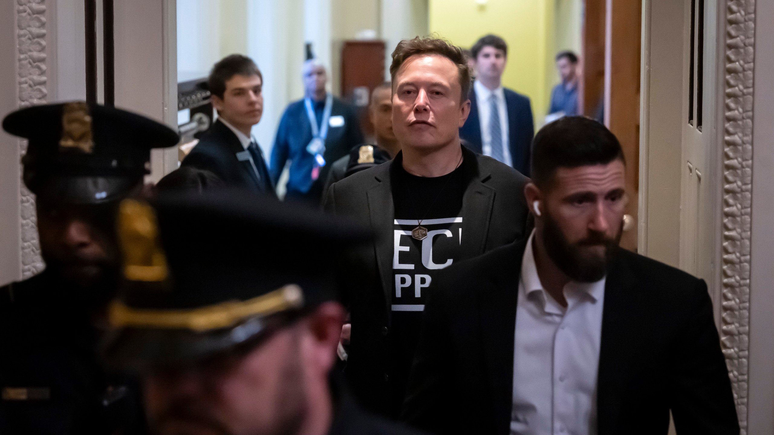 Elon Musk leaves after meeting with Senate Republicans, at the Capitol in Washington, Wednesday, March 5, 2025. (AP Photo/Ben Curtis)