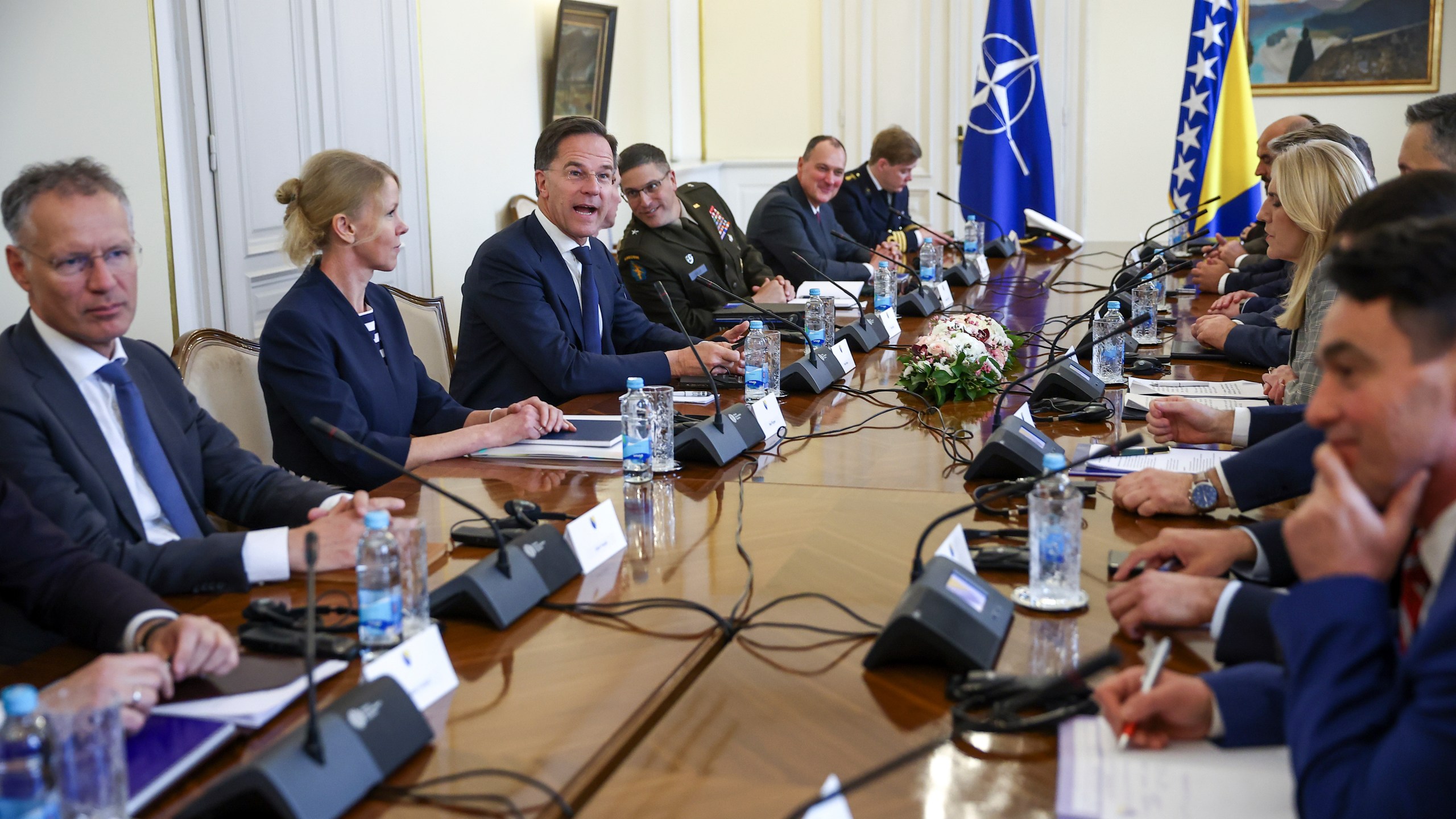 NATO Secretary General Mark Rutte, third left, talks with the members of the Bosnian Presidency at the start of their meeting in Sarajevo, Bosnia, Monday, March 10, 2025. (AP Photo/Armin Durgut)