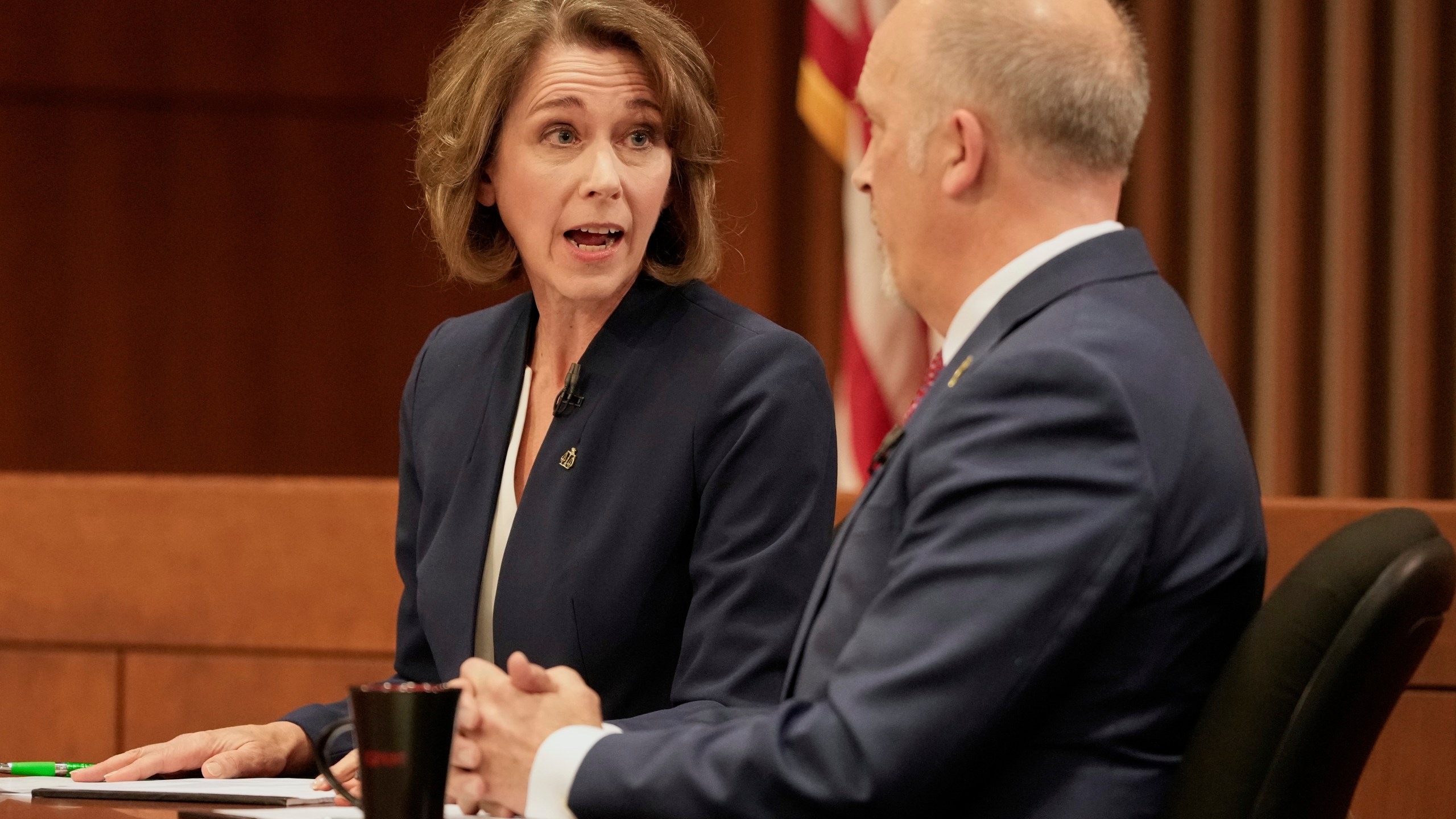 Wisconsin Supreme Court candidates Brad Schimel and Susan Crawford participate in a debate Wednesday, March 12, 2025, in Milwaukee. (AP Photo/Morry Gash)