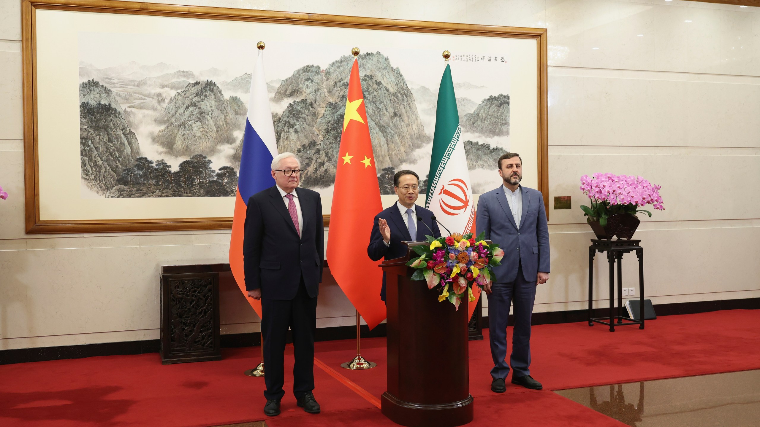 From left, Russian Deputy Foreign Minister Sergei Ryabkov, Chinese Vice Foreign Minister Ma Zhaoxu and Iranian Deputy Foreign Minister Kazem Gharibabadi meet with reporters after their meeting at Diaoyutai State Guest House on March 14, 2025 in Beijing, China.(Lintao Zhang/Pool Photo via AP)