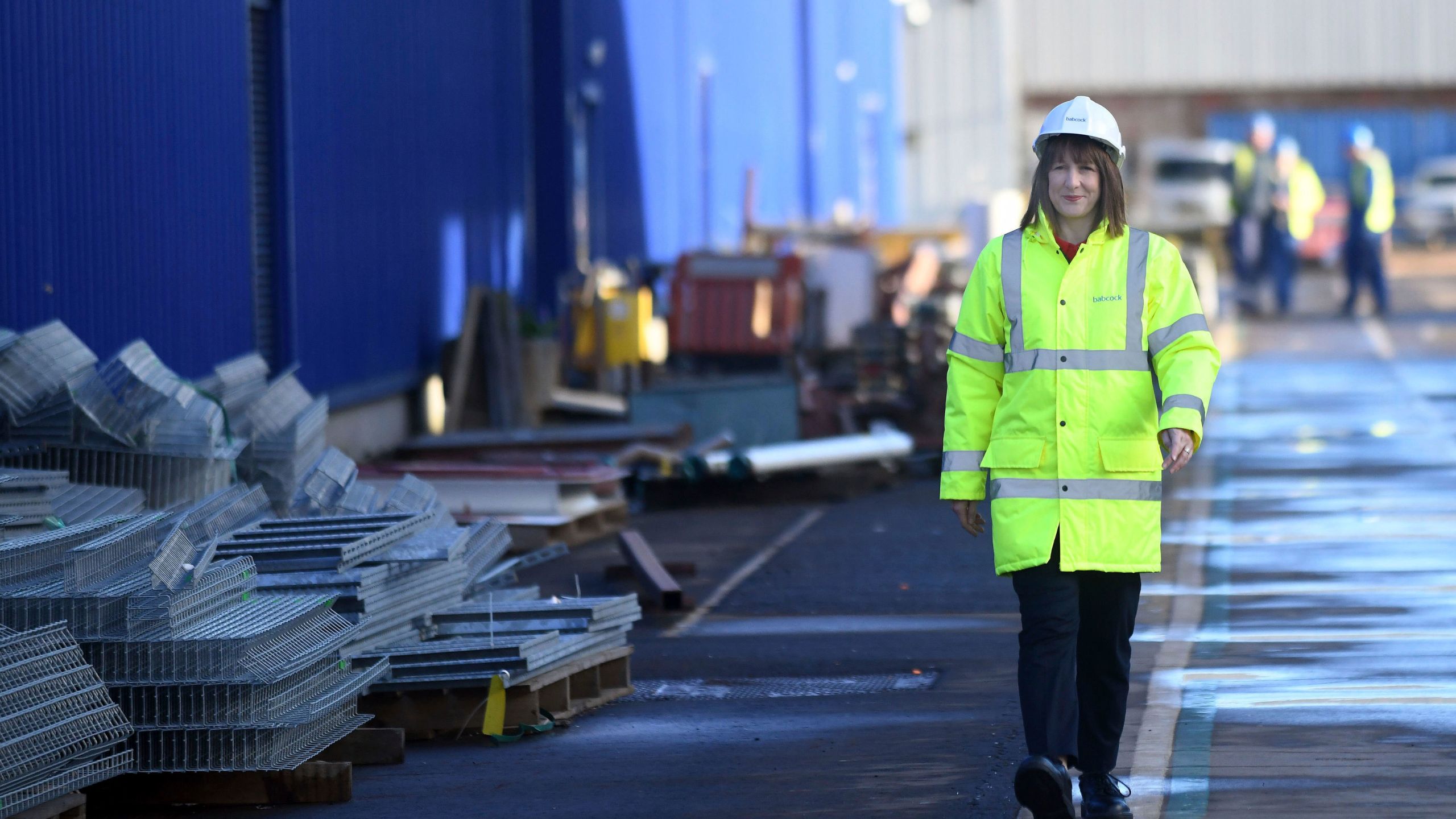 Britain's Chancellor of the Exchequer Rachel Reeves walks, during a visit to Babcock International, in Rosyth, Scotland, Friday March 14, 2025. (Mike Boyd/PA via AP)
