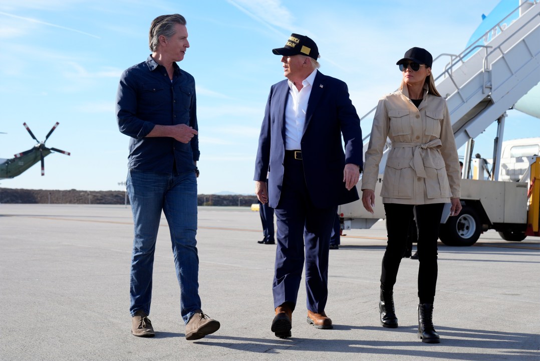 FILE - California Gov. Gavin Newsom, left, welcomes President Donald Trump and first lady Melania Trump upon their arrival on Air Force One at Los Angeles International Airport in Los Angeles, Jan. 24, 2025. (AP Photo/Mark Schiefelbein, File)