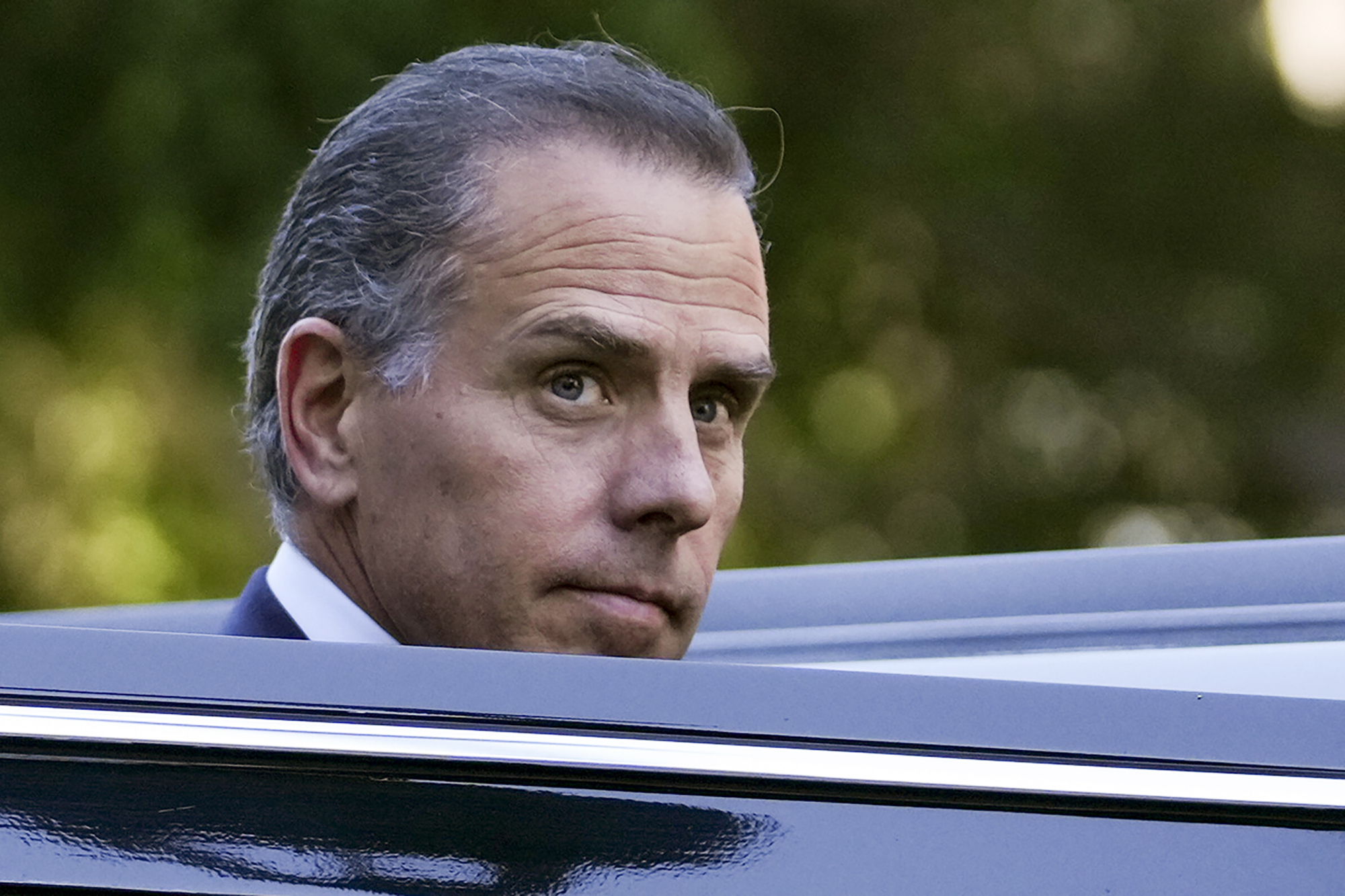 Hunter Biden steps into a vehicle