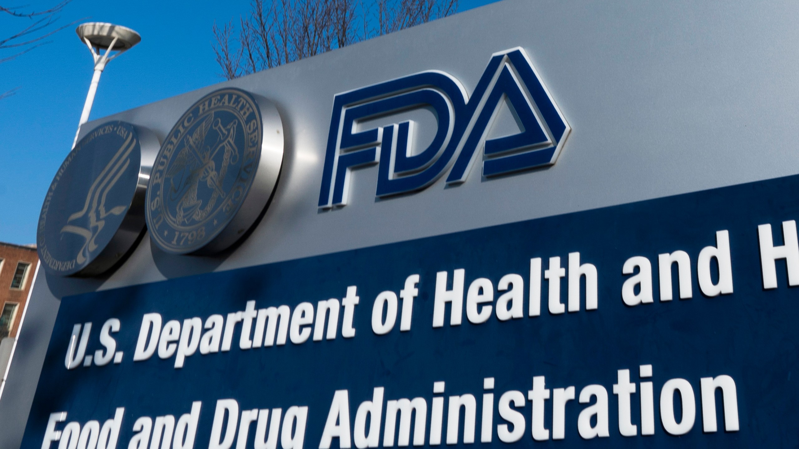 A sign for the U.S. Food and Drug Administration is displayed outside their offices in Silver Spring, Md., Dec. 10, 2020.