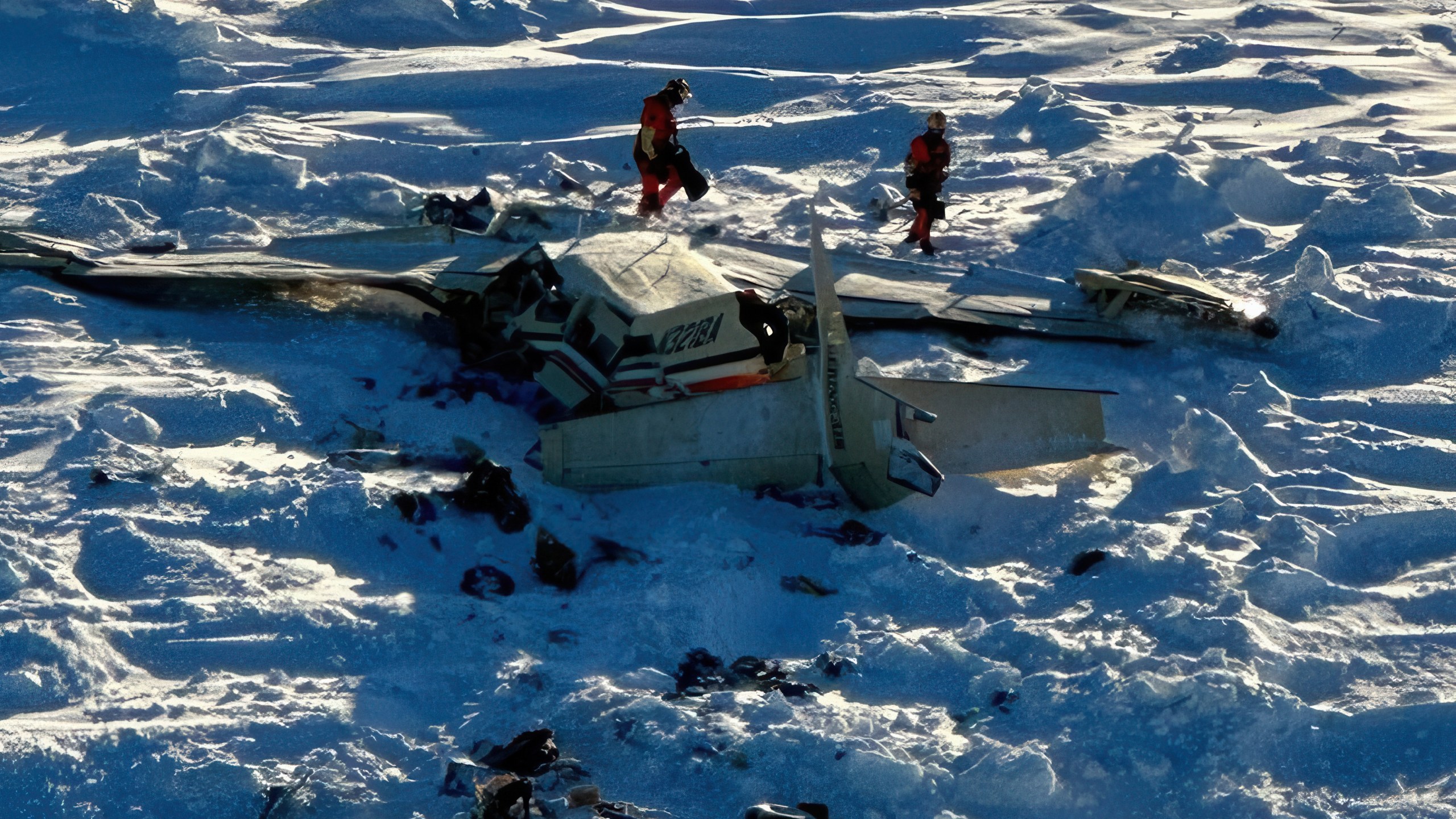FILE - This photo provided by the U.S. Coast Guard on Feb. 7, 2025, shows a small commuter plane that crashed in western Alaska on a flight that was bound for the hub community of Nome. (U.S. Coast Guard via AP, File)