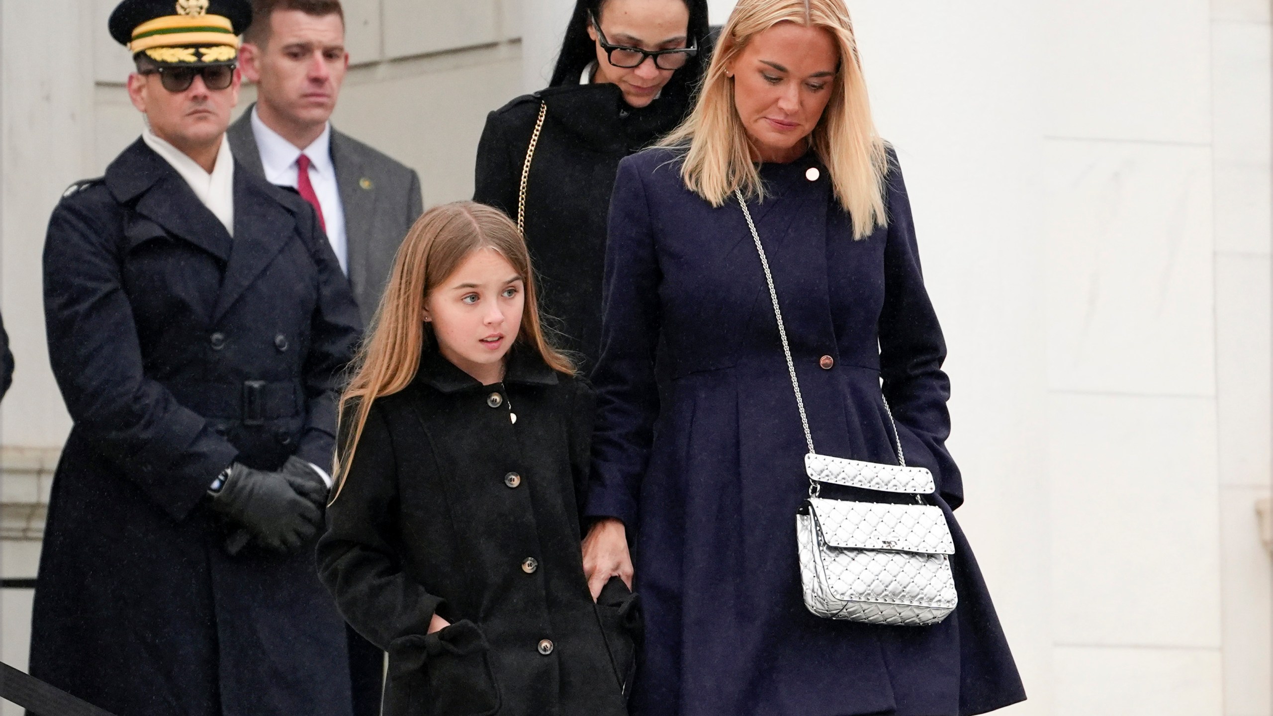 FILE - Vanessa Trump and Chloe Trump arrive before President-elect Donald Trump participates in a wreath laying ceremony at Arlington National Cemetery, Sunday, Jan. 19, 2025, in Arlington, Va. (AP Photo/Evan Vucci,File)