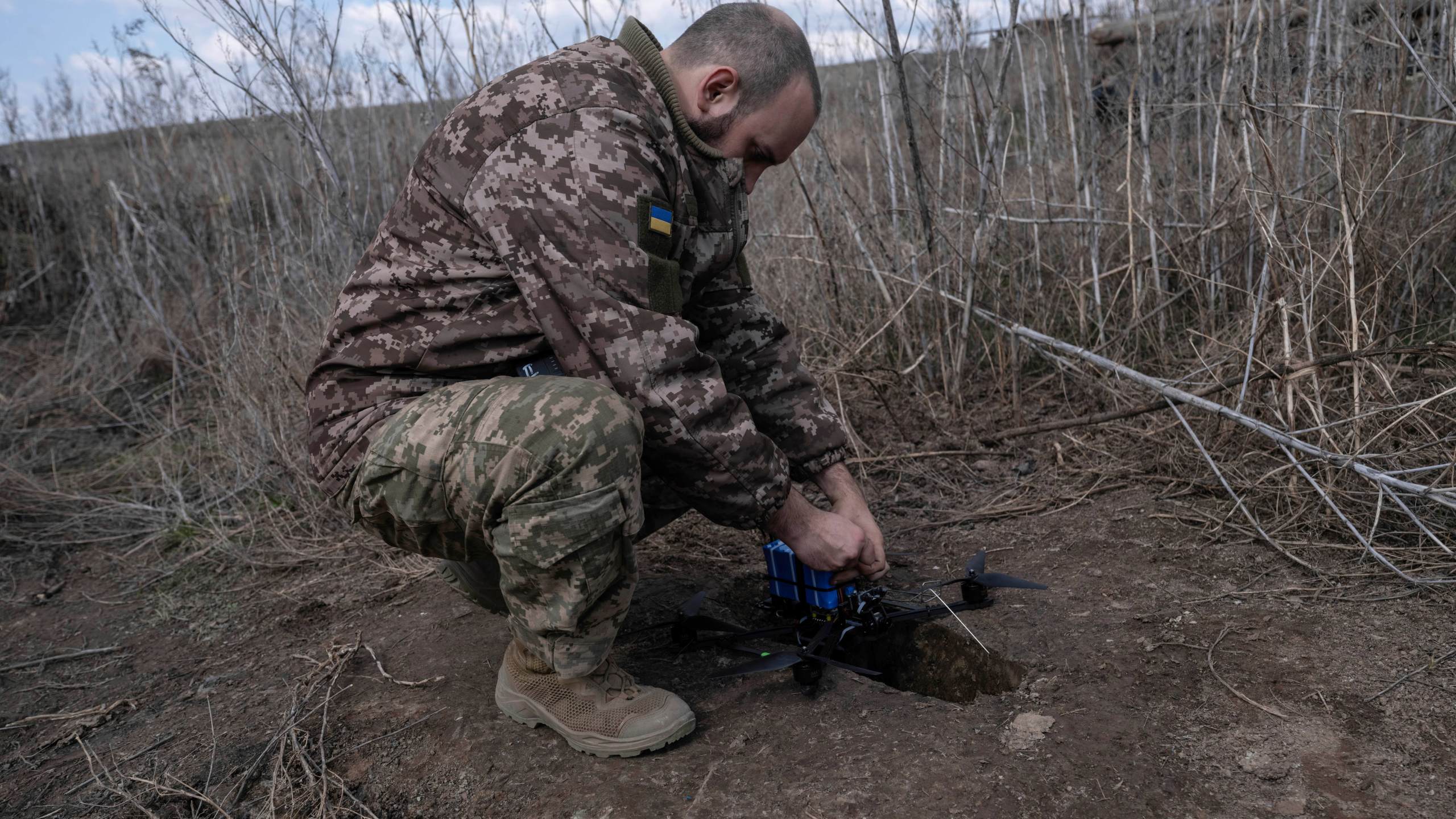 In this photo provided by Ukraine's 93rd Kholodnyi Yar Separate Mechanized Brigade press service, a soldier gets ready to fire FPV drones towards Russian positions in a shelter in Kramatorsk direction, Donetsk region, Ukraine, Saturday, March 22, 2025. (Iryna Rybakova/Ukraine's 93rd Mechanized Brigade via AP)