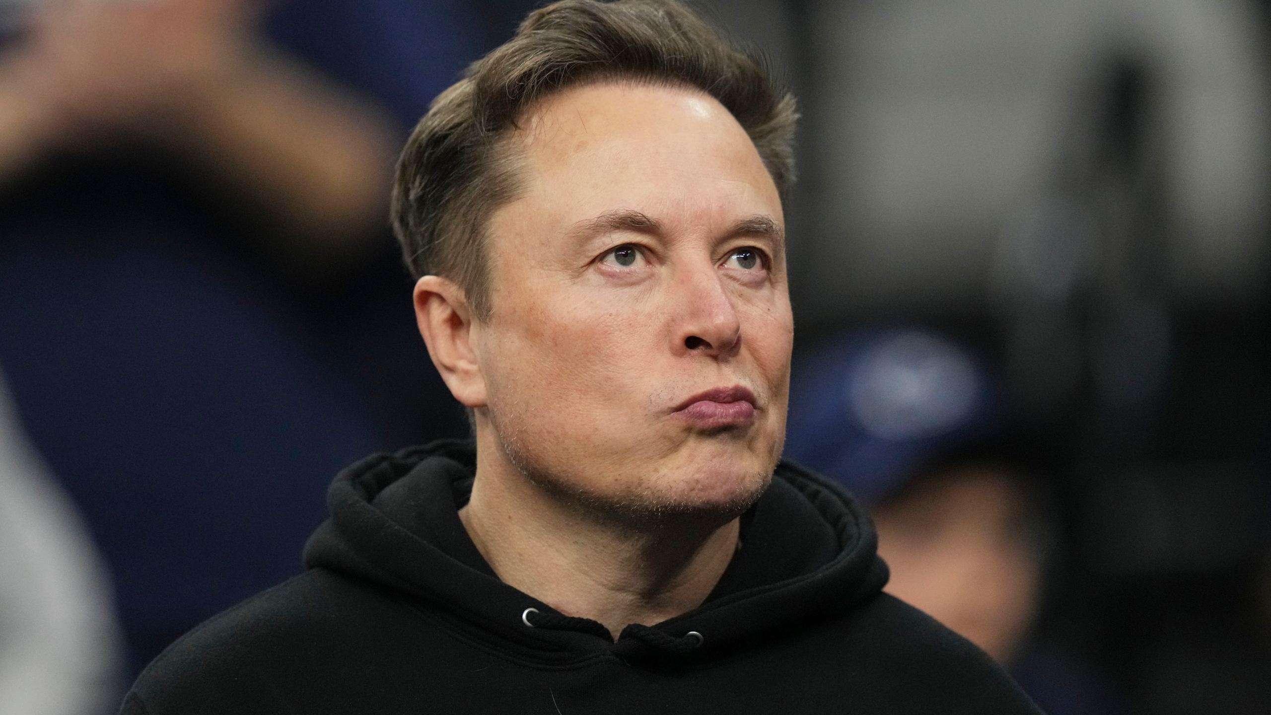 Elon Musk attends the finals at the NCAA wrestling championship, Saturday, March 22, 2025, in Philadelphia. (AP Photo/Matt Rourke)