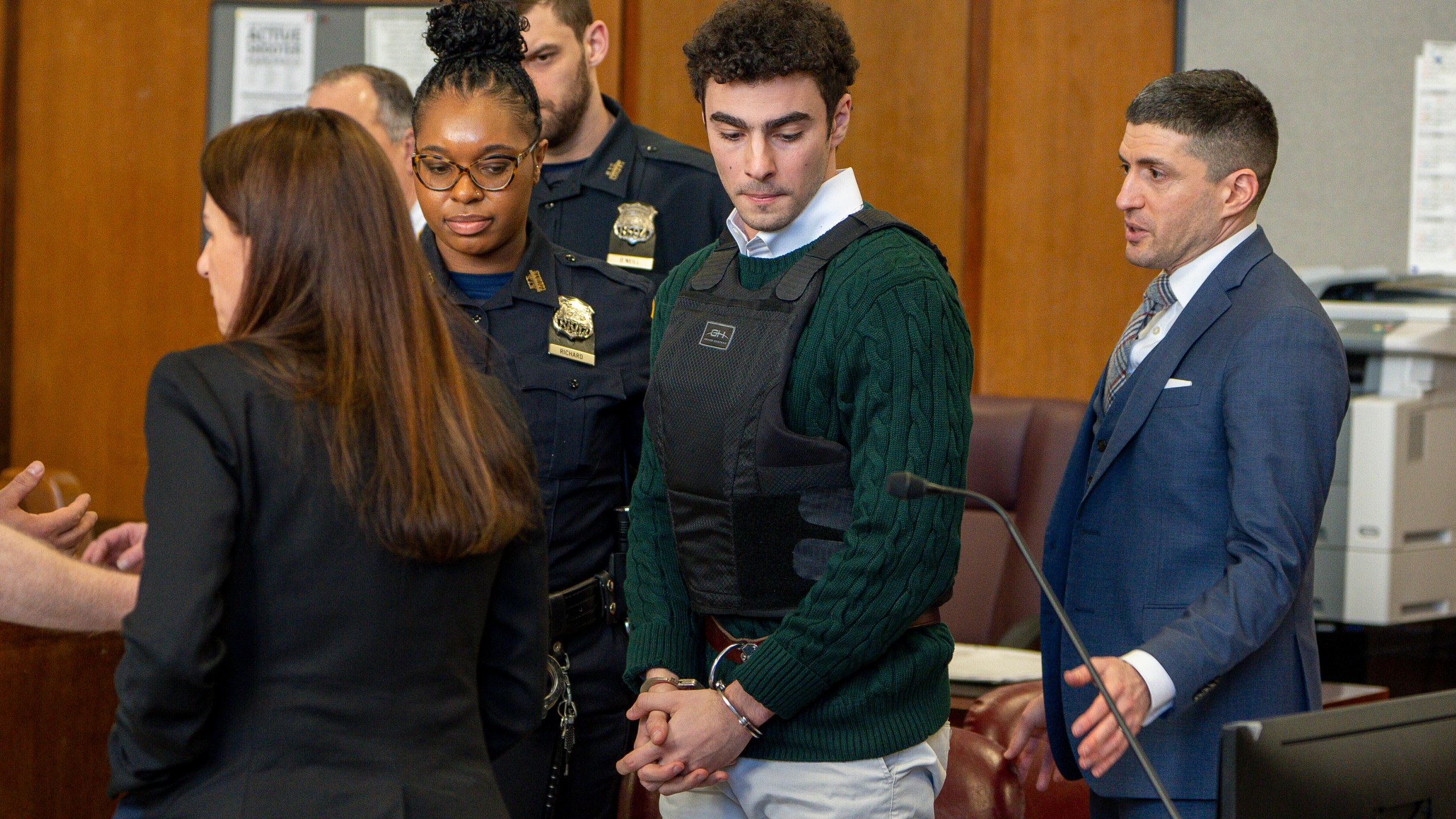 FILE - Luigi Mangione, accused of fatally shooting the UnitedHealthcare CEO Brian Thompson in New York City and leading authorities on a five-day search is scheduled, appears in court for a hearing, Friday, Feb. 21, 2025, in New York. (Steven Hirsch/New York Post via AP, Pool, File)