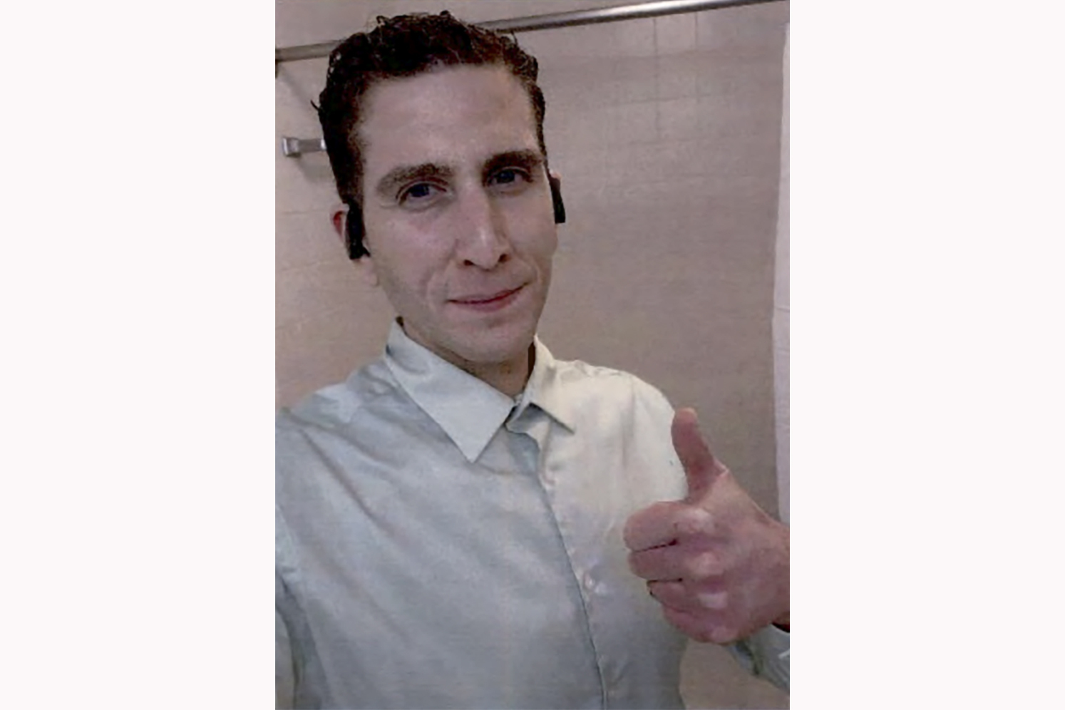 Bryan Kohberger gives a thumbs-up in an apparent selfie