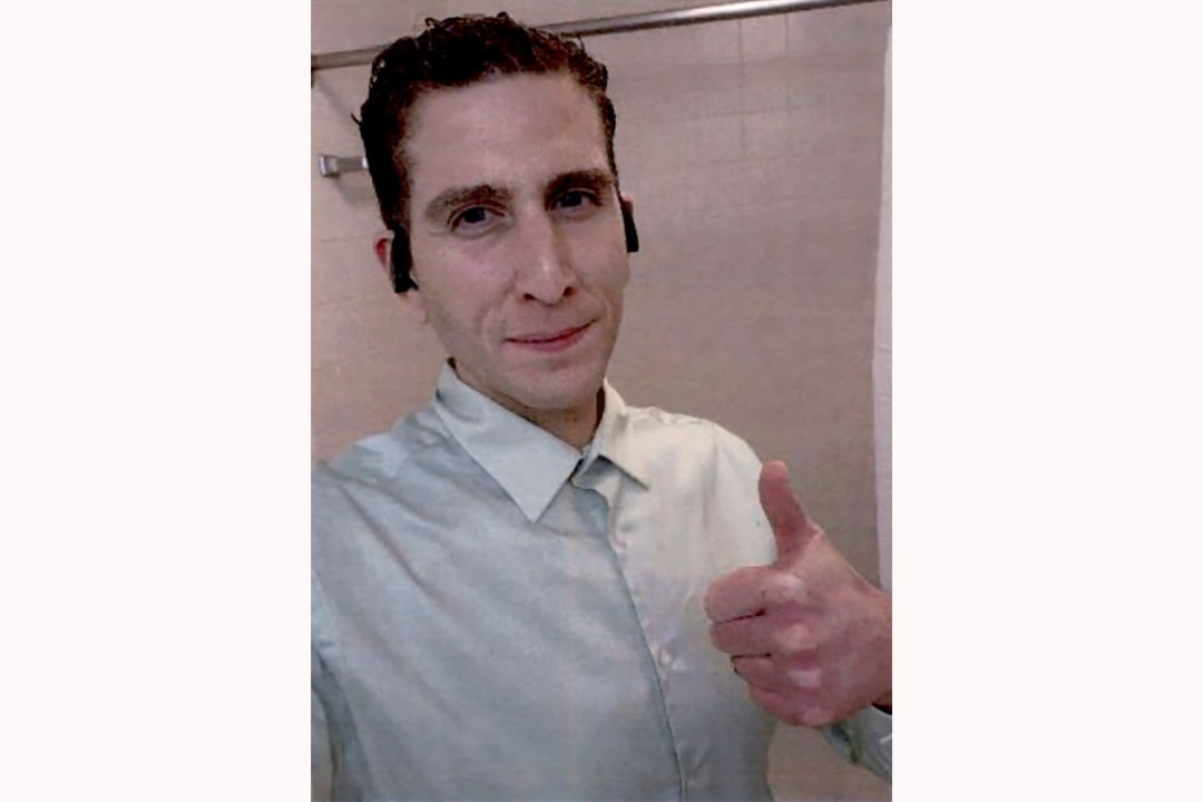 Bryan Kohberger gives a thumbs-up in an apparent selfie