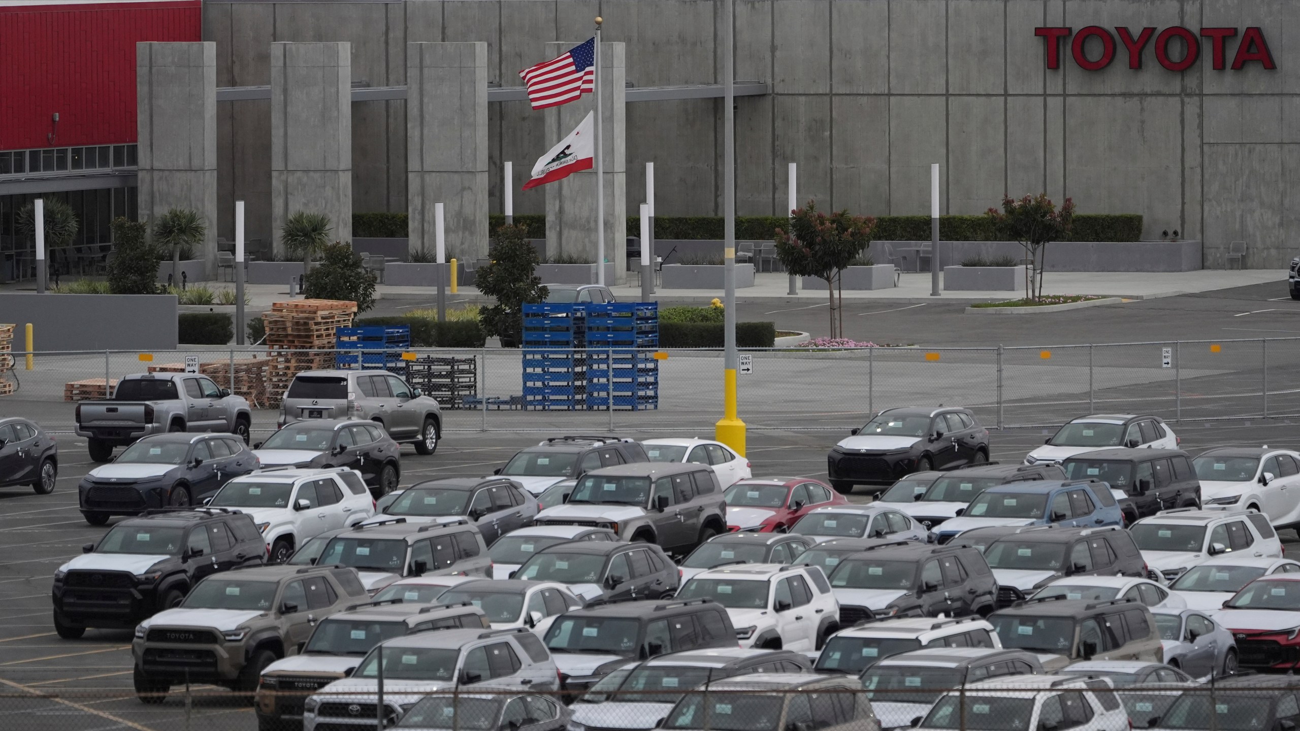 New Toyota vehicles are stored at the Toyota Logistics Service Inc., an imports processing facility at the Port of Long Beach in Long Beach, Calif., Wednesday, March 26, 2025. (AP Photo/Damian Dovarganes)