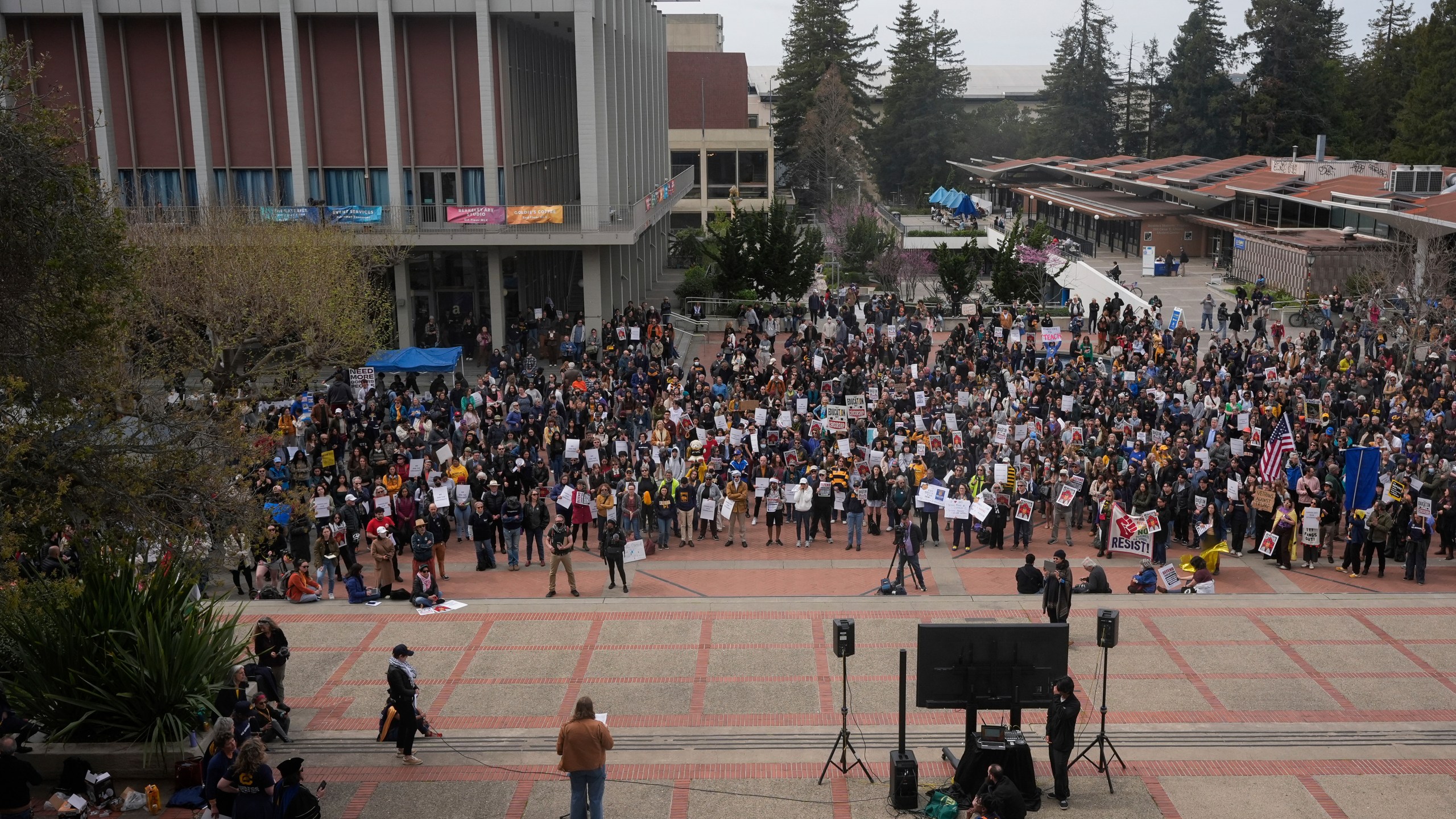 People rally at the University of California, Berkeley campus to protest the Trump administration Wednesday, March 19, 2025, in Berkeley, Calif. (AP Photo/Godofredo A. Vásquez)