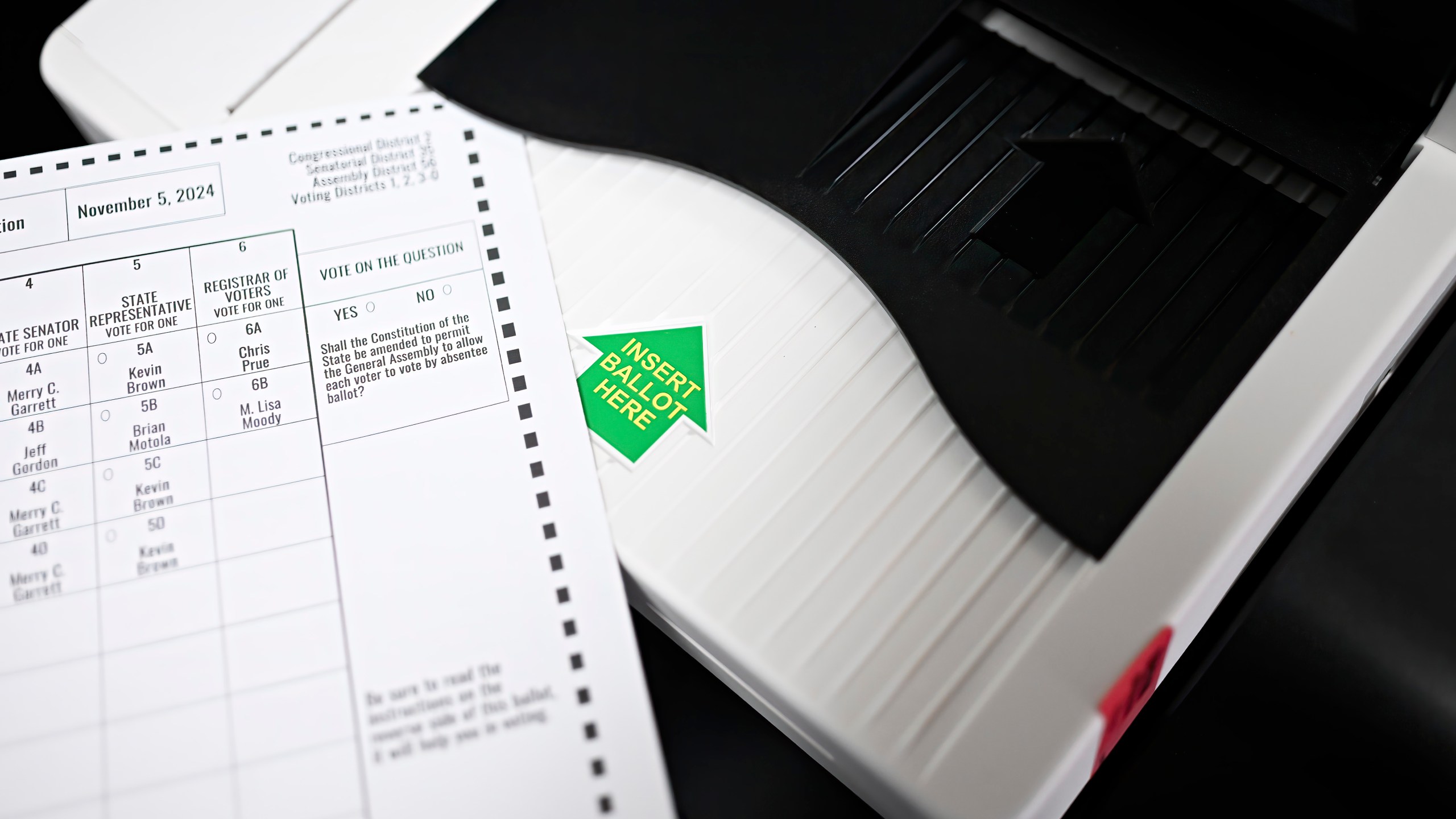 New voting tabulators are pictured at the Registrars of Voters Office, Thursday, March 27, 2025, in Vernon, Conn. (AP Photo/Jessica Hill)