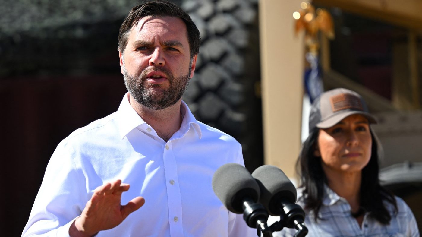 US Vice President JD Vance, with the Director of National Intelligence Tulsi Gabbard, speaks to the press.