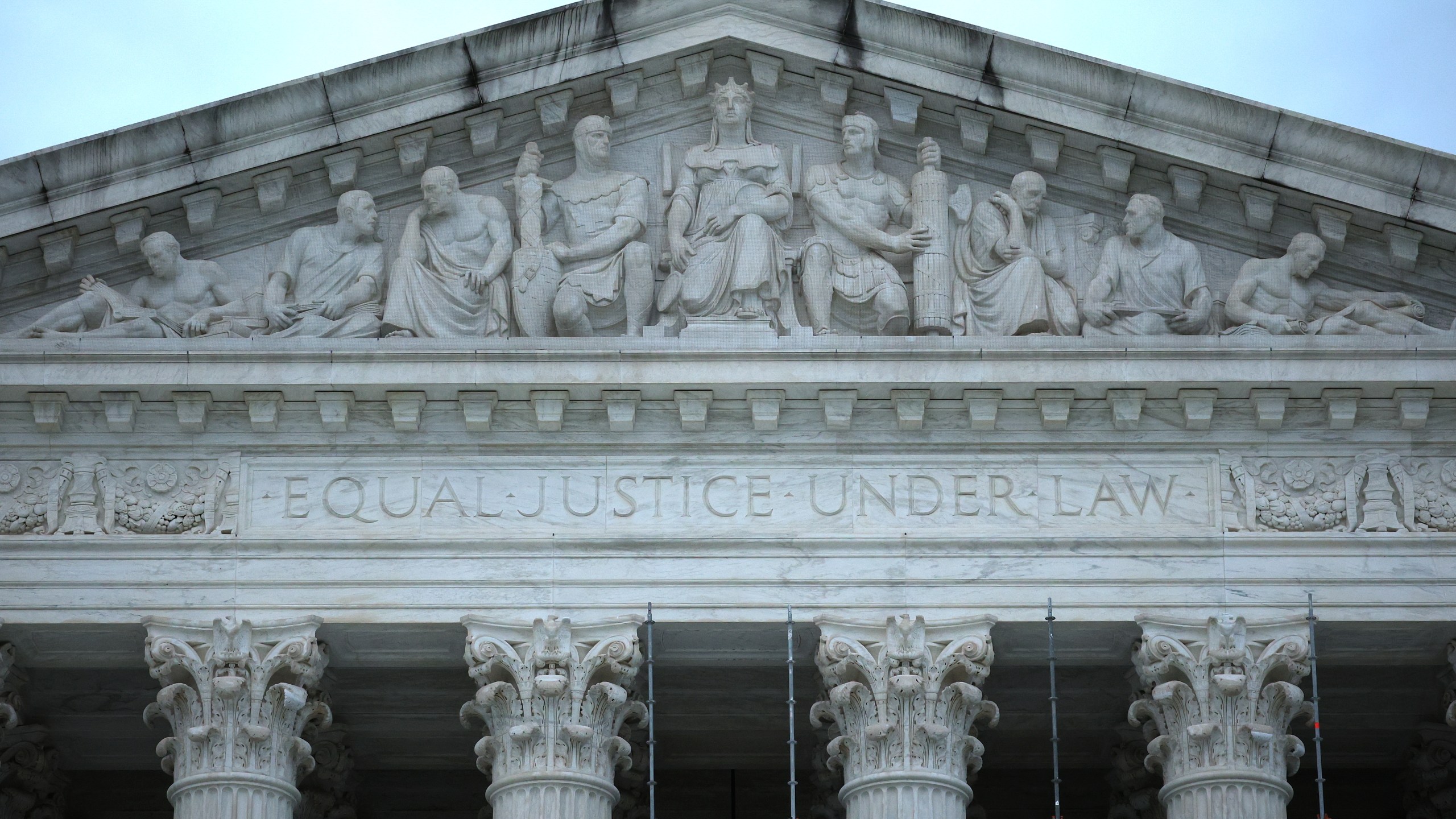 top of facade of Supreme Court building