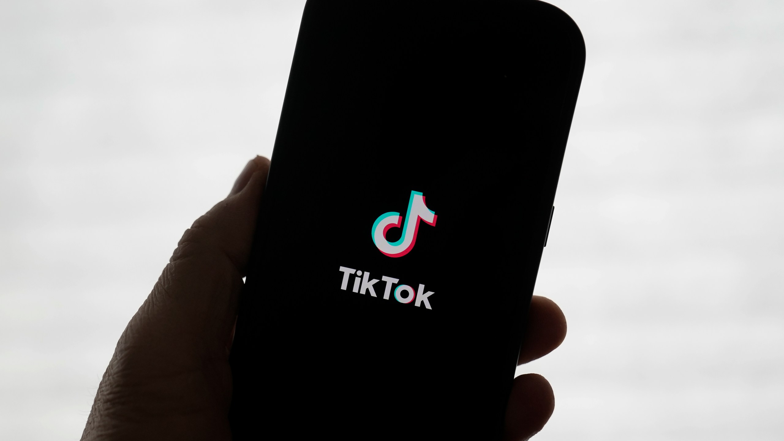 FILE - A TikTok logo is shown on a phone in San Francisco, Friday, Jan. 17, 2025. (AP Photo/Jeff Chiu, File)