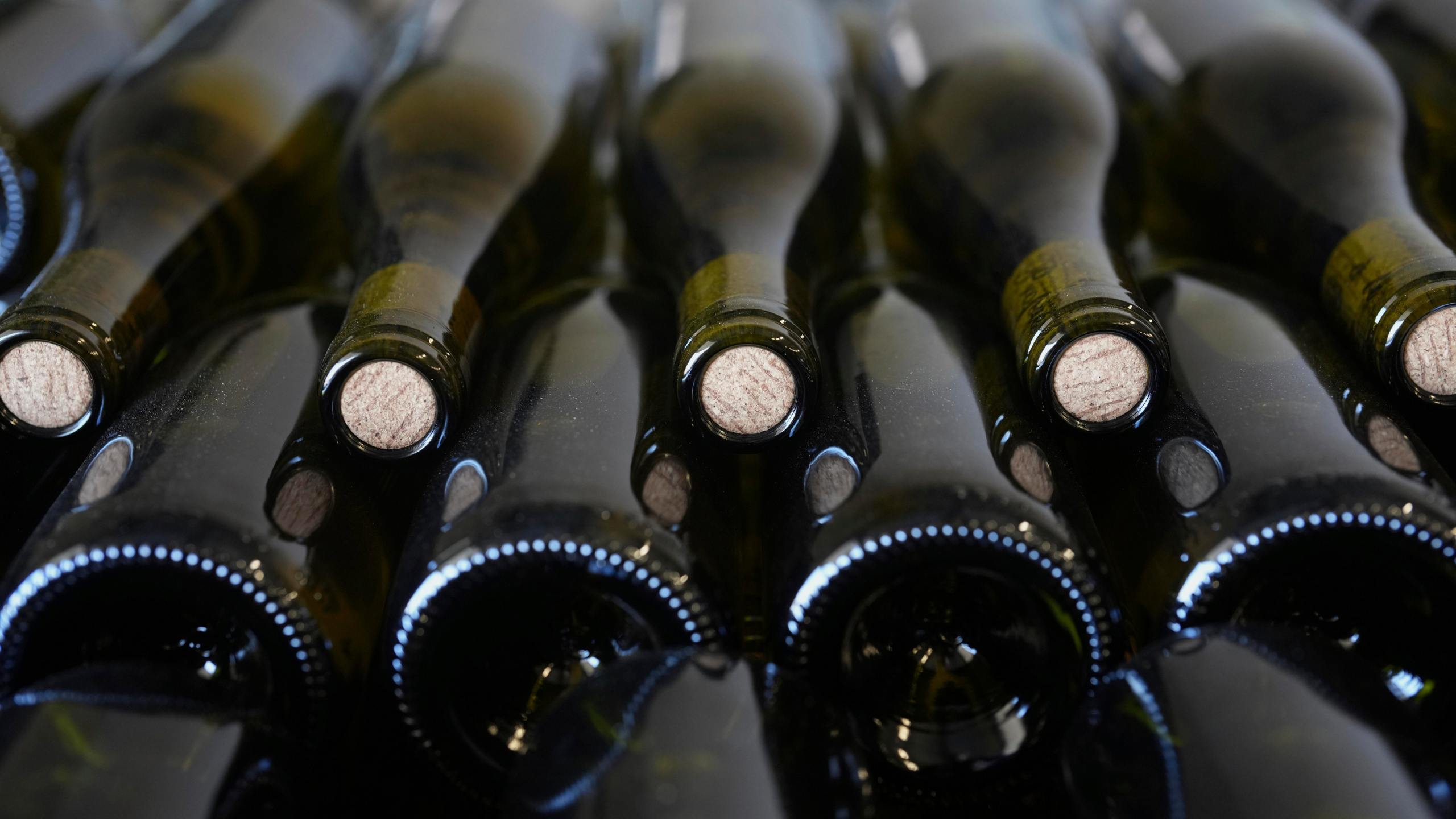 Bottles of Chablis wine are stored at the wine making facility of winegrower Vincent Dampt, in Chablis, Burgundy region, eastern France, Thursday, April 3, 2025. (AP Photo/Thibault Camus)
