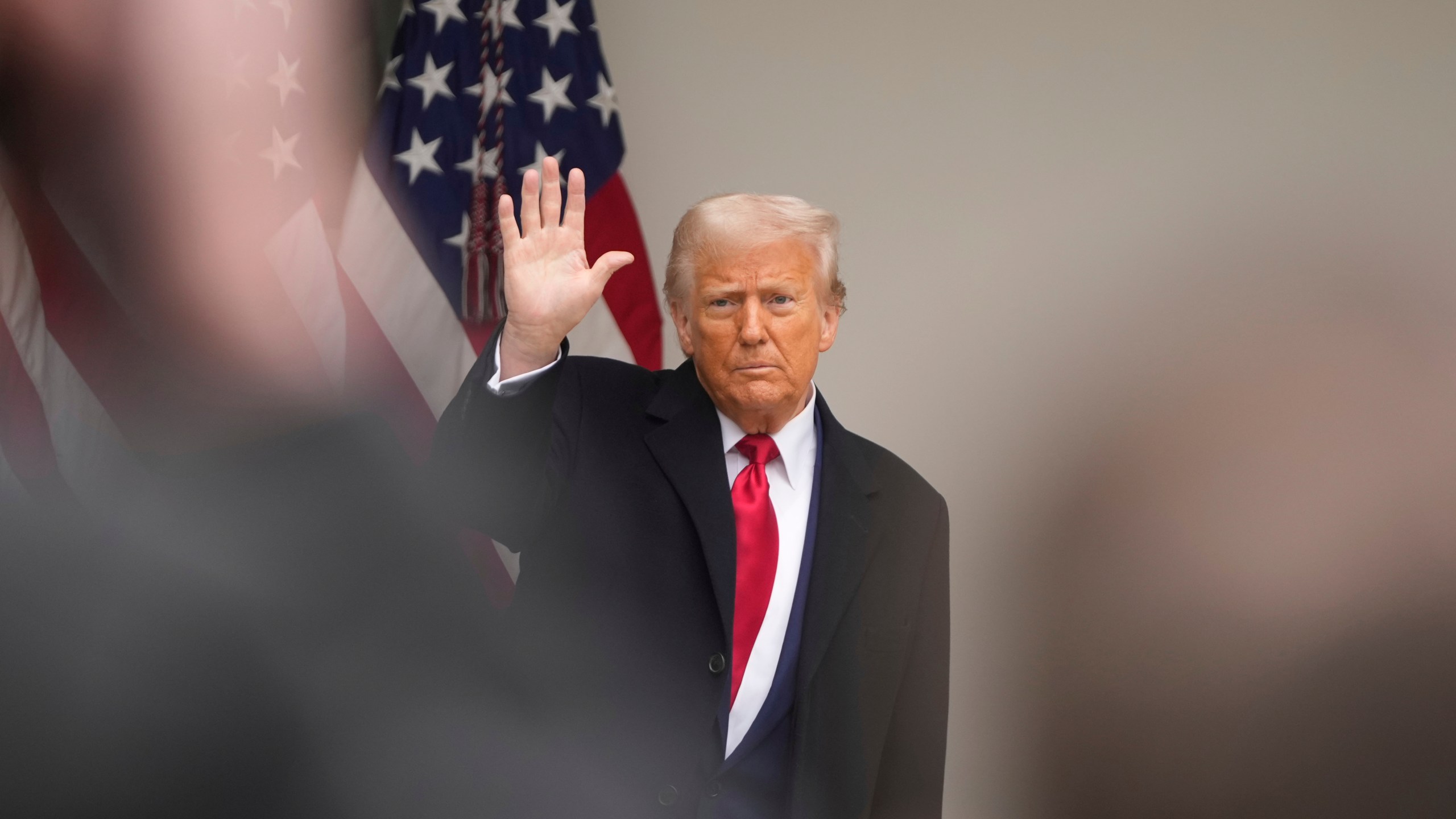 President Donald Trump waves after an event to announce new tariffs in the Rose Garden at the White House, Wednesday, April 2, 2025, in Washington. (AP Photo/Mark Schiefelbein)