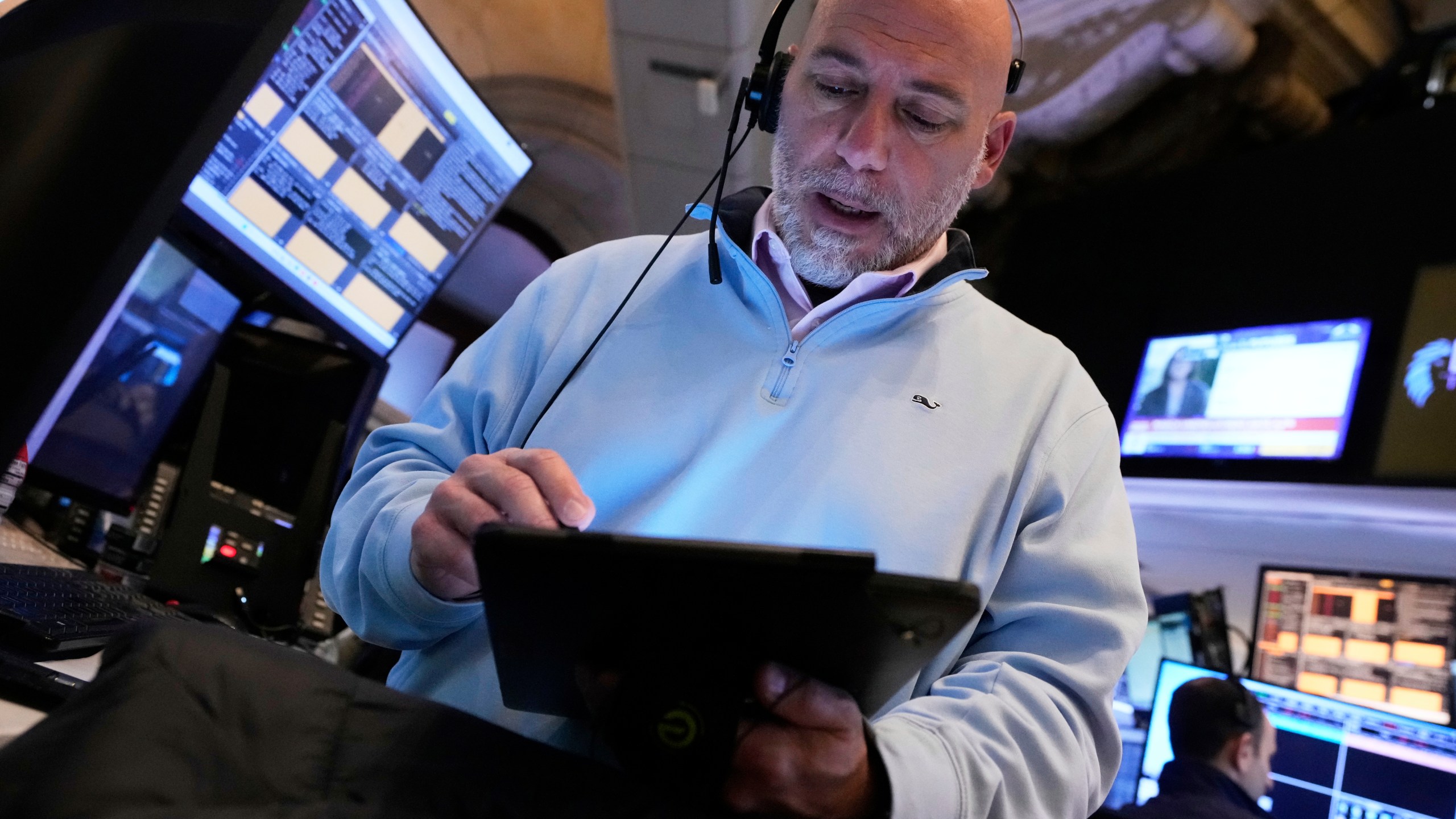 Trader Vincent Napolitano works on the floor of the New York Stock Exchange, Friday, April 4, 2025. (AP Photo/Richard Drew)
