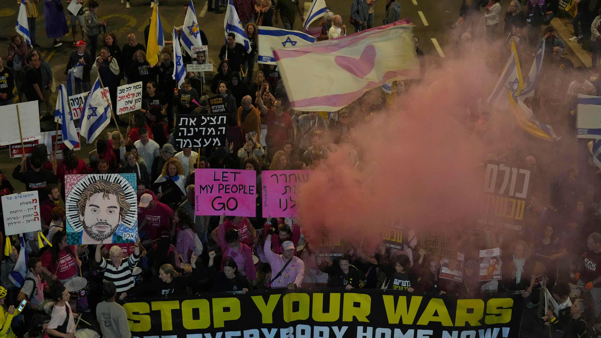 People take part in a protest demanding the immediate release of hostages held by Hamas in the Gaza Strip