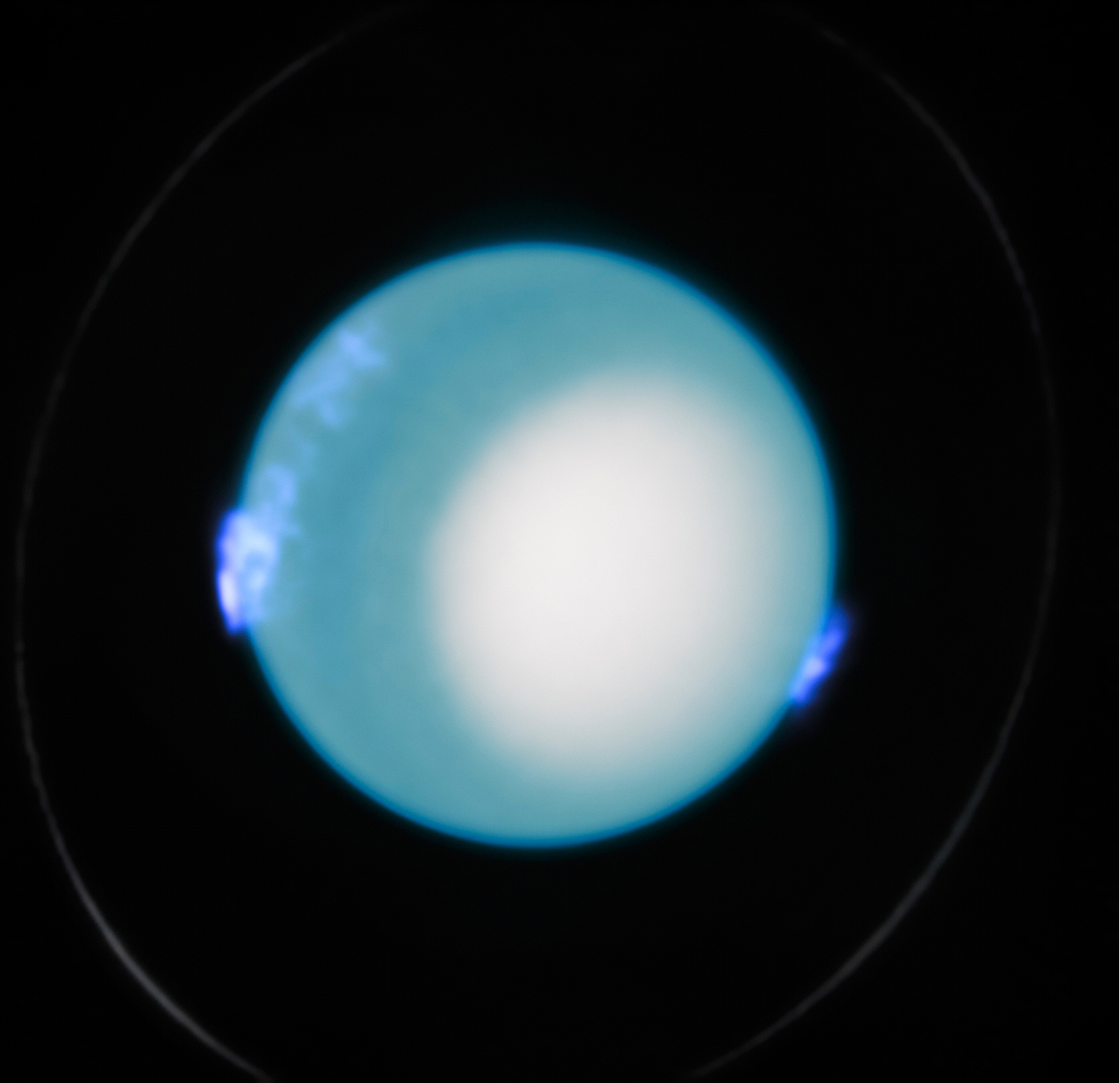 This image provided by ESA/Hubble shows Uranus' aurorae