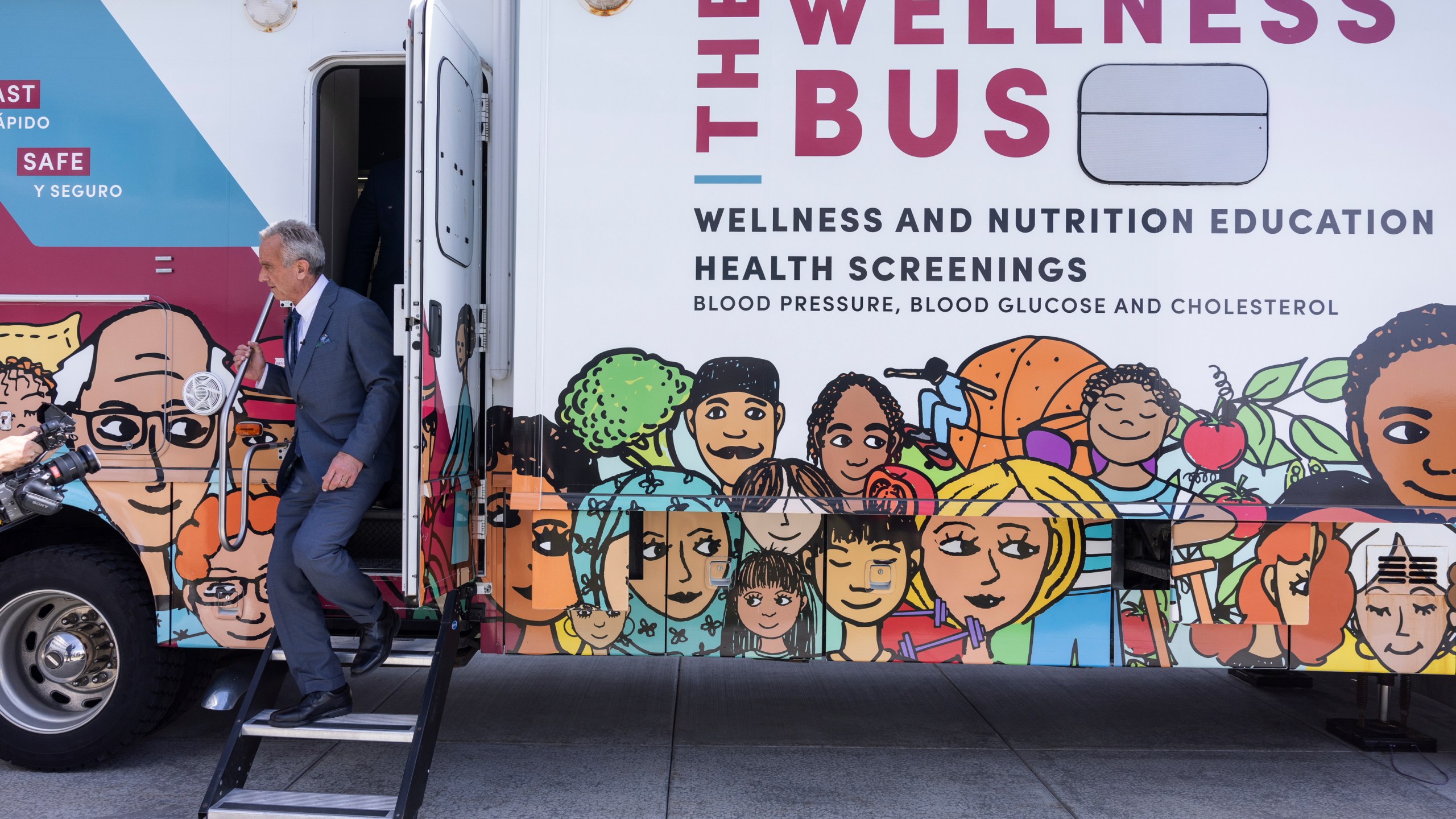 Health Secretary Robert F. Kennedy Jr. exits a bus as he visits University of Utah to discuss Utah's new fluoride ban and food additives legislation, Monday, April 7, 2025, in Salt Lake City. (AP Photo/Melissa Majchrzak)
