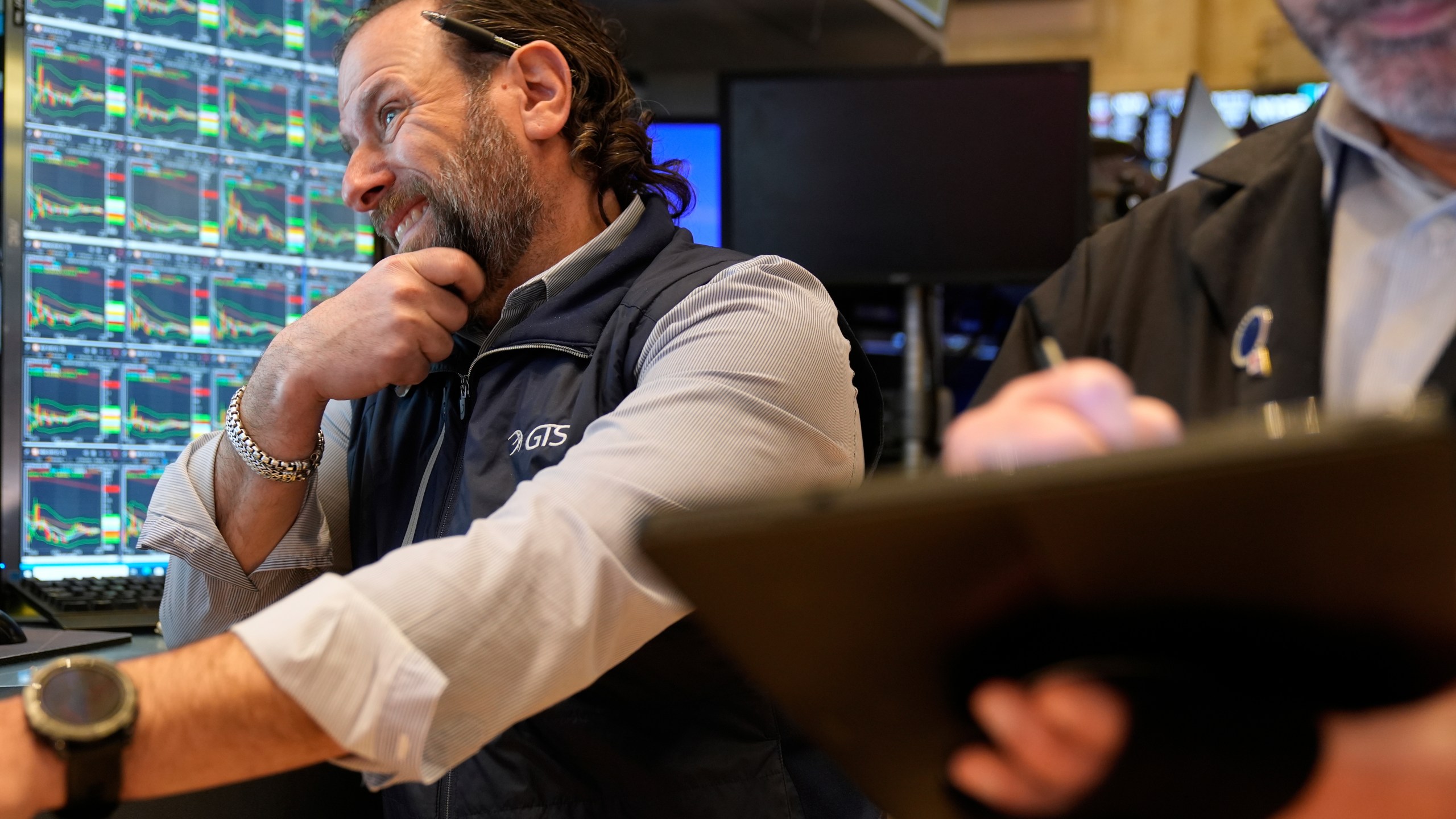 Mike Pistillo Jr. works on the floor at the New York Stock Exchange in New York, Tuesday, April 8, 2025. (AP Photo/Seth Wenig)