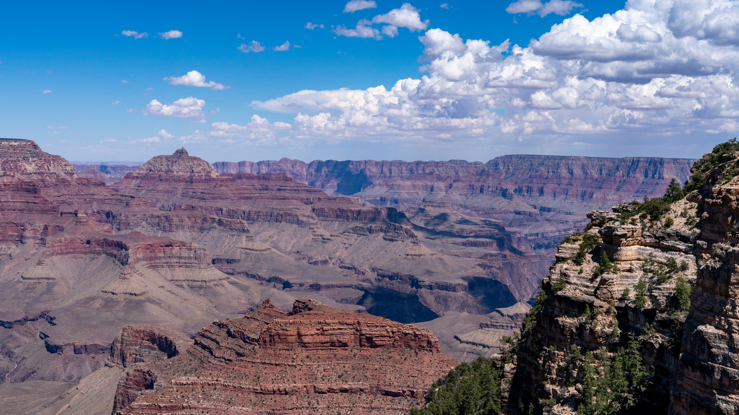 FILE - Clouds pass over the South Rim of Grand Canyon National Park in Grand Canyon Village, Ariz., Aug. 8, 2023. (AP Photo/Alex Brandon, File)