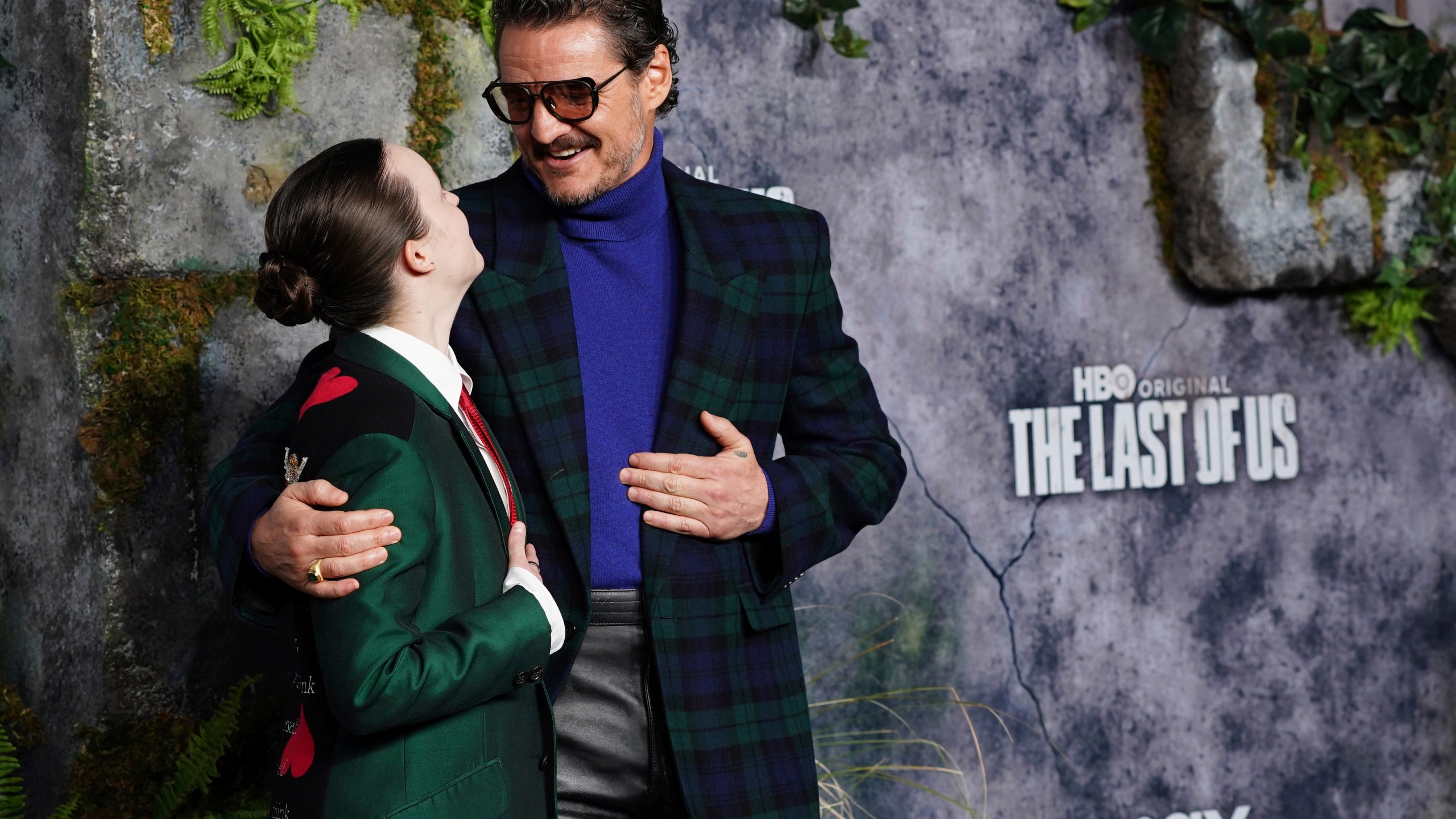 Bella Ramsey, left, and Pedro Pascal arrive at the season two premiere of "The Last of Us" on Monday, March 24, 2025, at TCL Chinese Theatre in Los Angeles. (Photo by Jordan Strauss/Invision/AP)