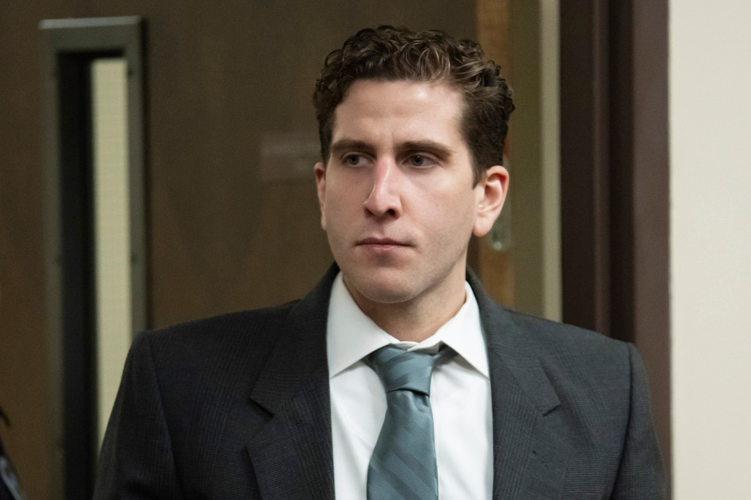 Bryan Kohberger is escorted into court wearing a suit