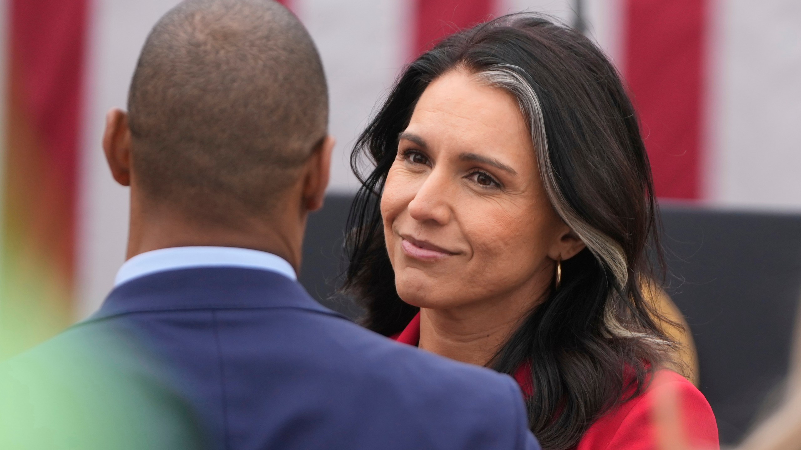 Director of National Intelligence Tulsi Gabbard arrives before President Donald Trump speaks during an event to announce new tariffs in the Rose Garden at the White House, Wednesday, April 2, 2025, in Washington. (AP Photo/Mark Schiefelbein)
