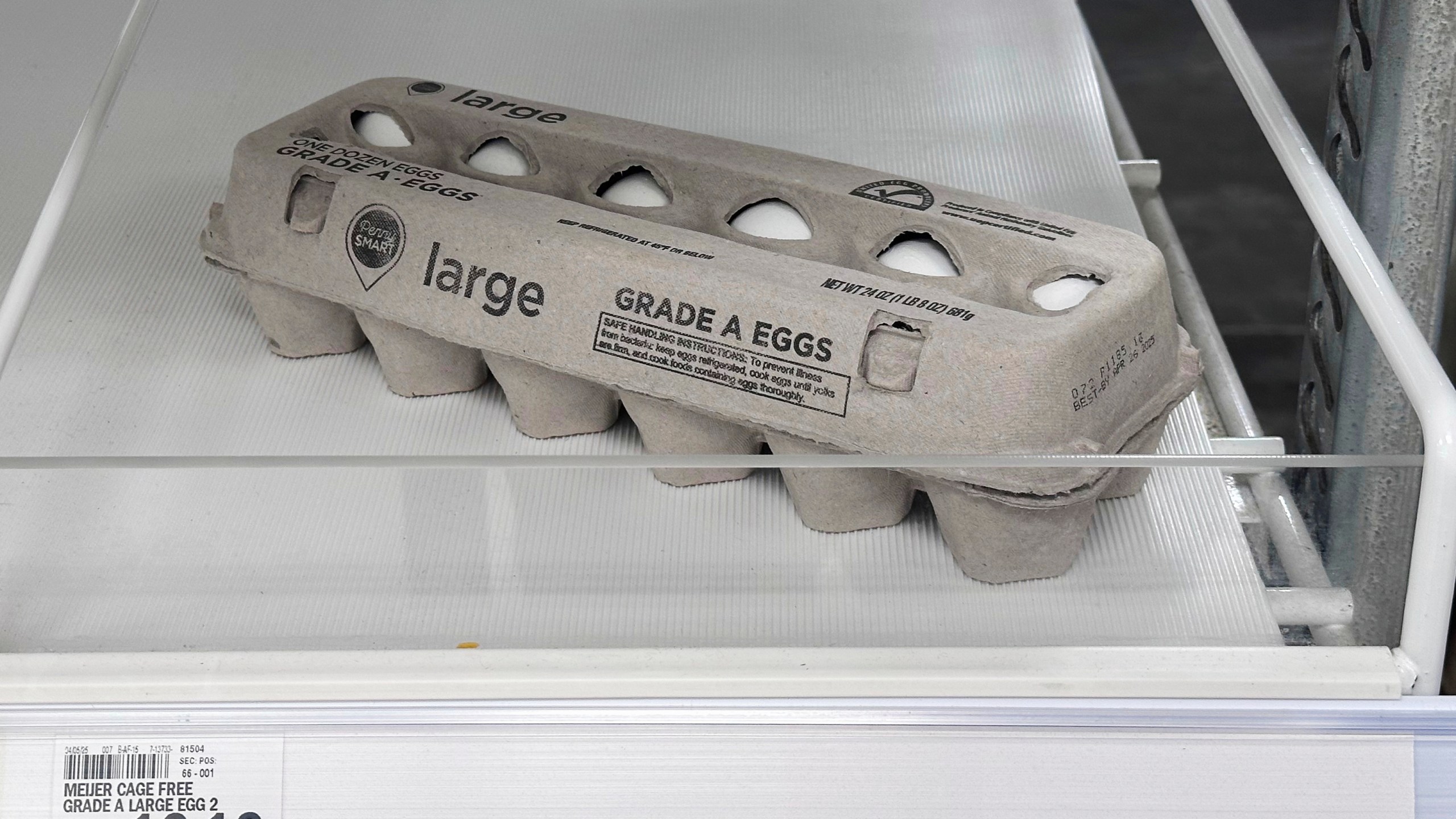Eggs are displayed in a grocery store in Carmel, Ind., Wednesday, April 9, 2025. (AP Photo/Michael Conroy)