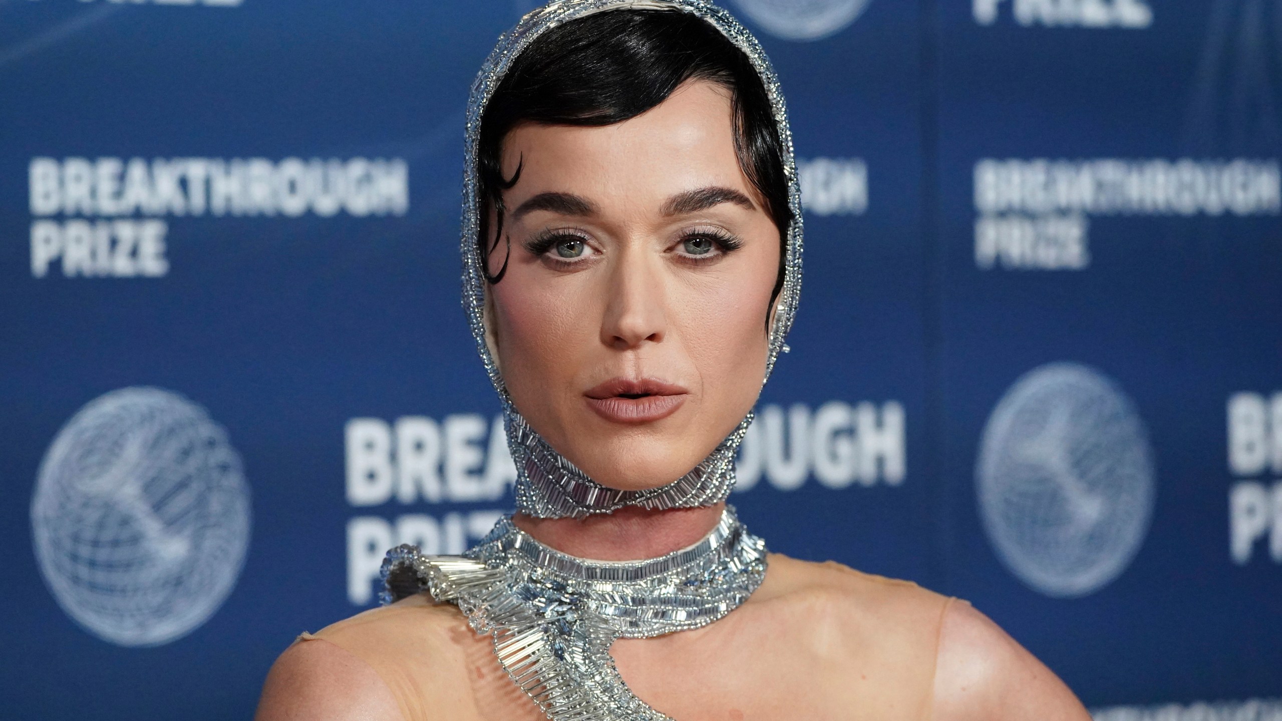 FILE - Katy Perry arrives at the 11th Breakthrough Prize Ceremony on Saturday, April 5, 2025, in Los Angeles. (Photo by Jordan Strauss/Invision/AP, File)