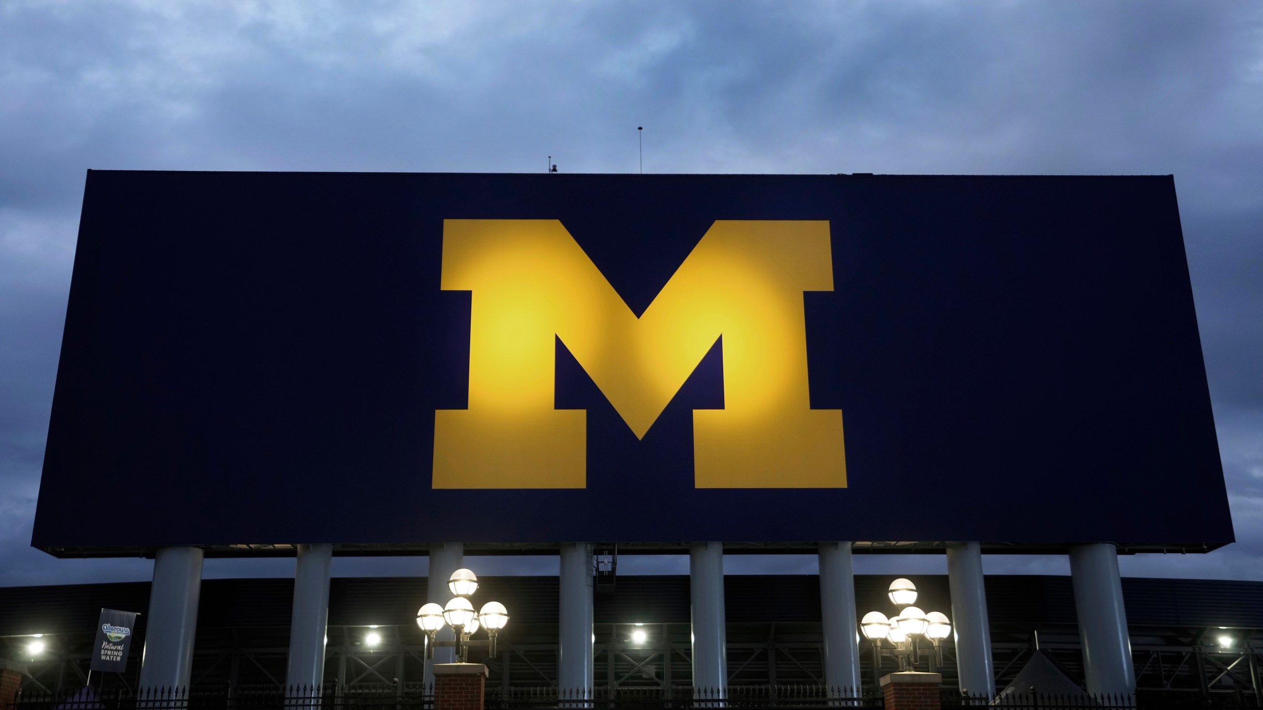 FILE - The block M logo for the University of Michigan is displayed at the school's NCAA college football stadium in Ann Arbor, Mich., on Nov. 10, 2023. (AP Photo/Paul Sancya, File)