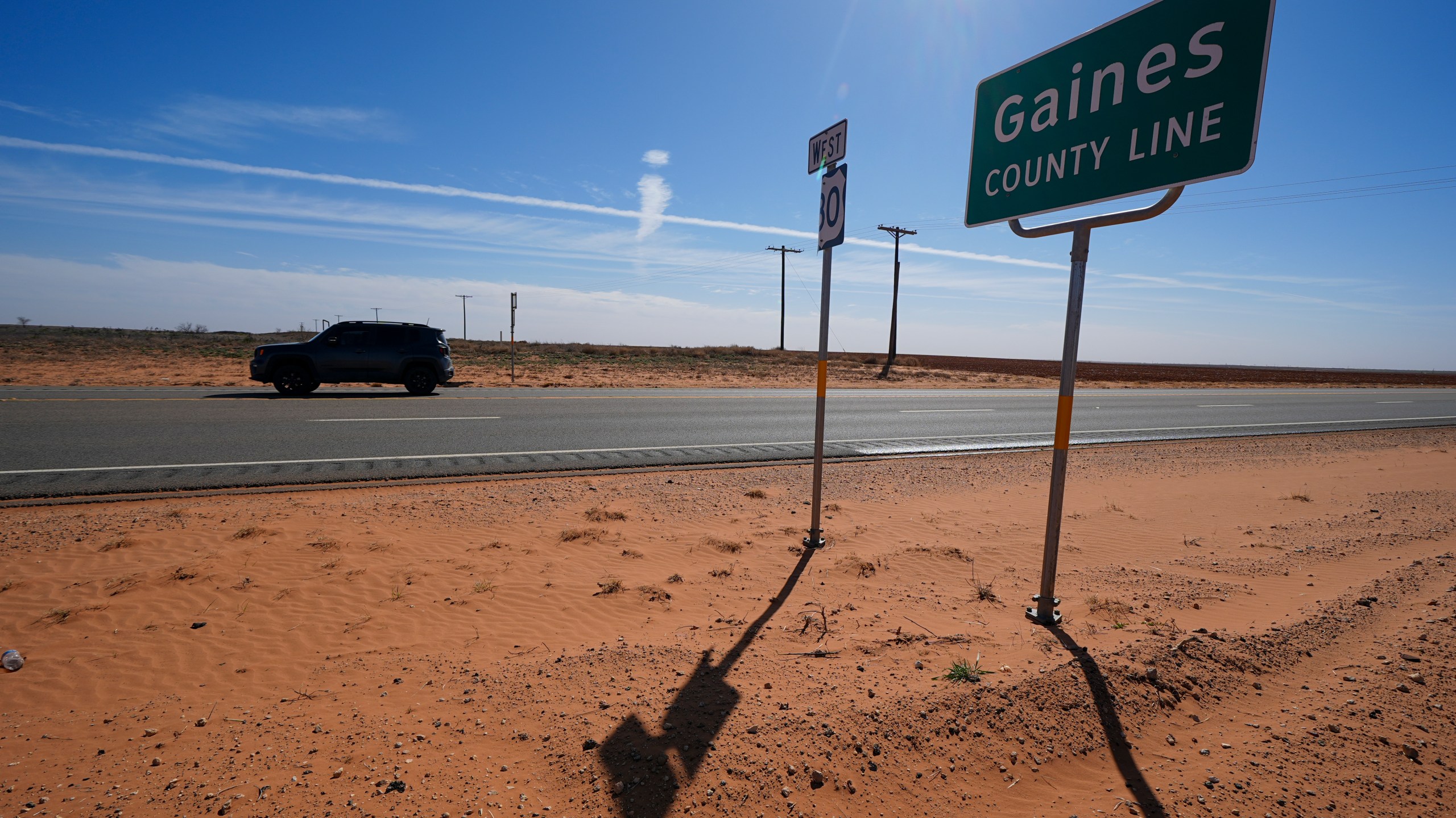 FILE - The Gaines County line is seen along Route 180 Wednesday, Feb. 26, 2025, in Lamesa, Texas. (AP Photo/Julio Cortez, File)